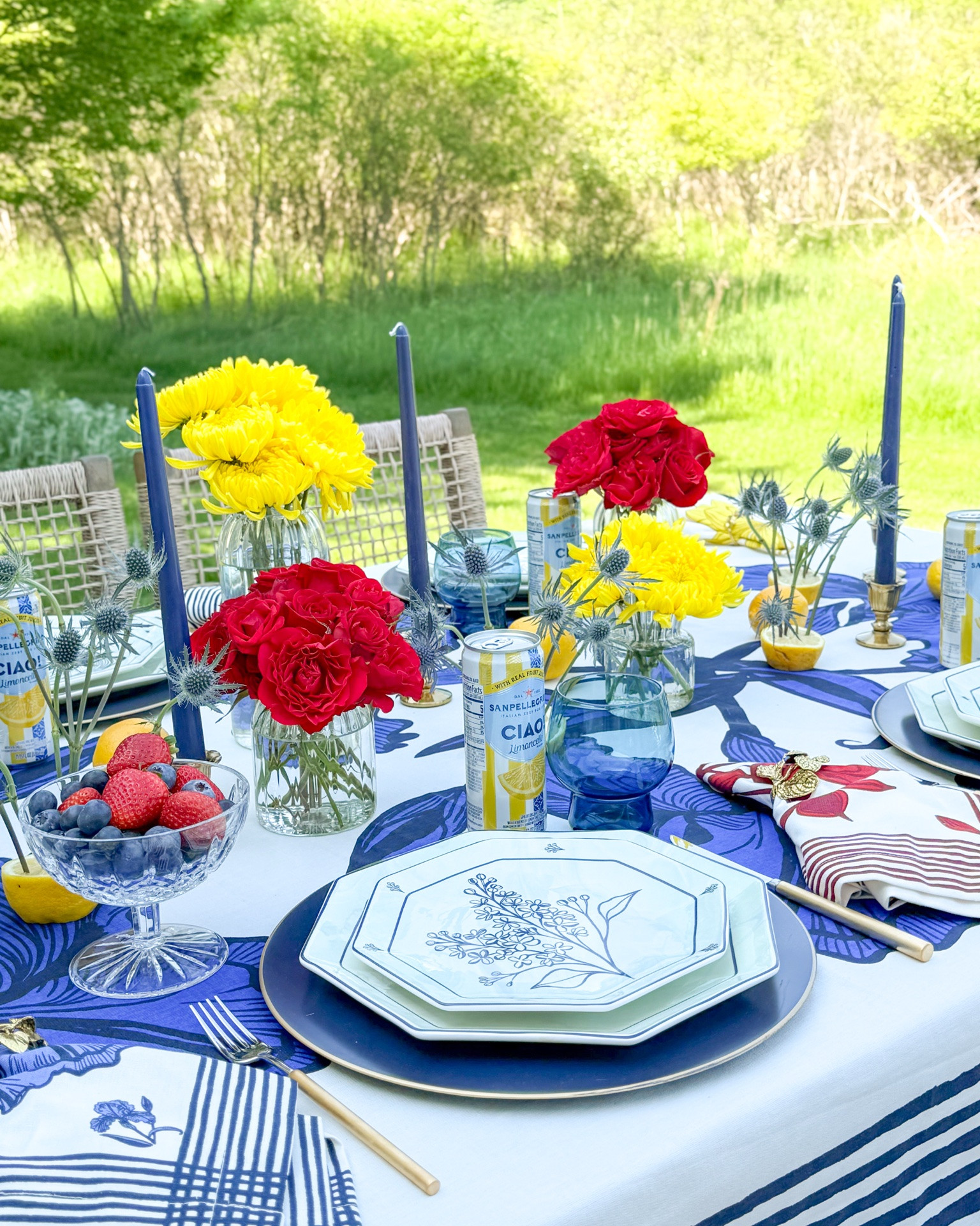 Shop my summer al fresco table!

Summer tablescape, outdoor dining, outdoor entertaining, blue and white decor, blue and white plates, bud vases, blue chargers, gold candleholders, glass pedestal, cake stand, crystal dish, gold flatware