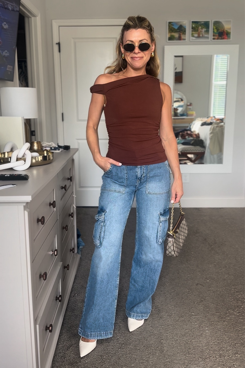 Cute fall transitional denim look. 

I’m wearing a small in the asymmetrical top and a 4 in the cargo pants 

Paired with my favorite Gucci bag and sunglasses and kitten heels 

#LTKSeasonal #LTKStyleTip #LTKWorkwear