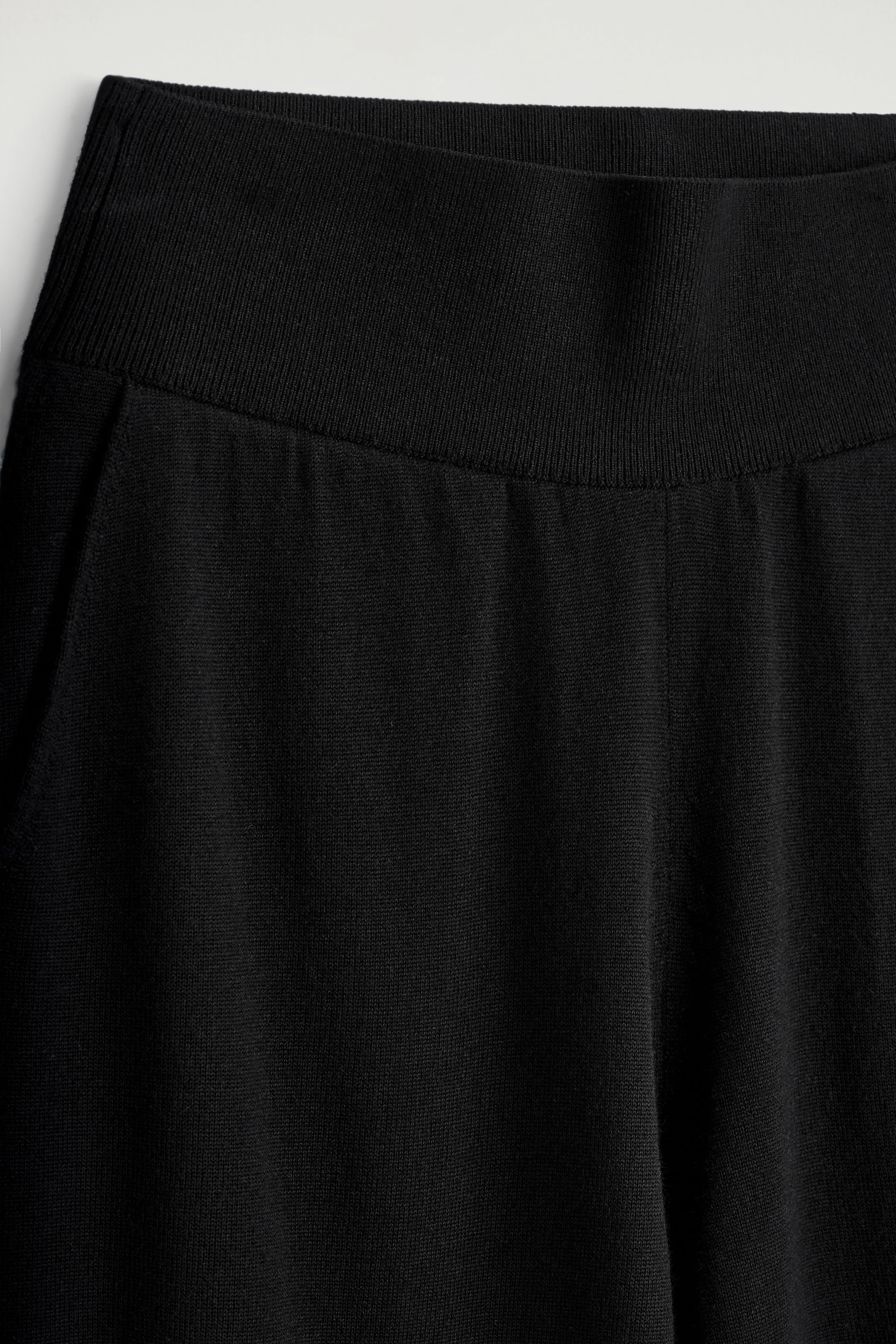 MERINO WOOL BARREL-LEG TROUSERS - BLACK | COS GB | COS UK