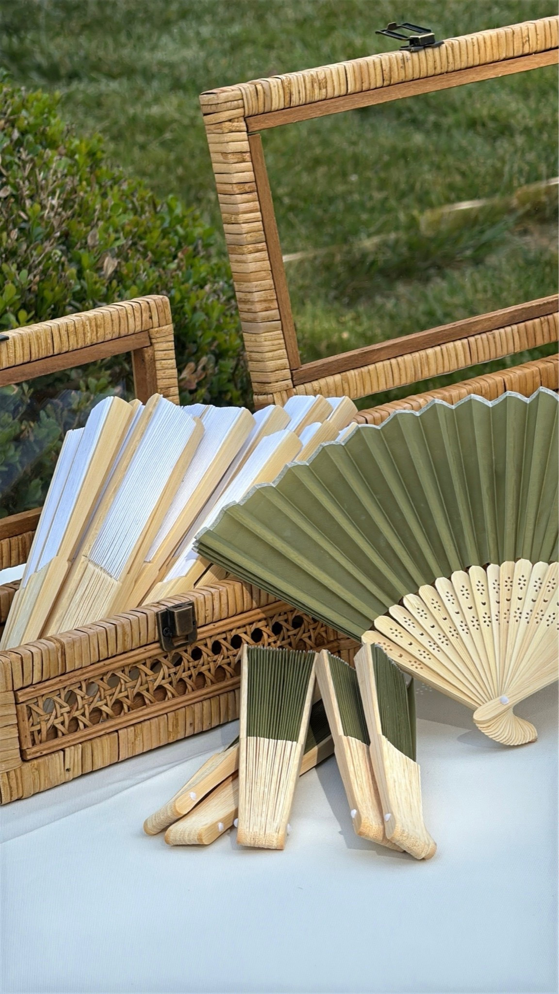 Still so glad we leaned into the rattan vibes! These boxes doubled as our card boxes on the gift table, and the quality was amazing. They even come in a two pack! Paper fans are also a must-have for outdoor, summer weddings. Your guests will use them!

#LTKWedding #LTKHome #LTKSaleAlert