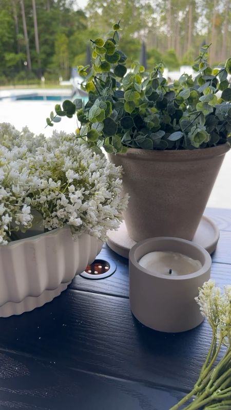 This baby breath from Walmart is such a fun and cheap option! When it arrives, it is very flat and smashed together, but you can fluff it and separate it, and it becomes the perfect outdoor floral.  I added it to one of my favorite Walmart planters. This is the large option so I am using seven babies breaths, but of course you would not need nearly as many if you’re using a smaller planter.

#LTKStyleTip #LTKVideo #LTKHome