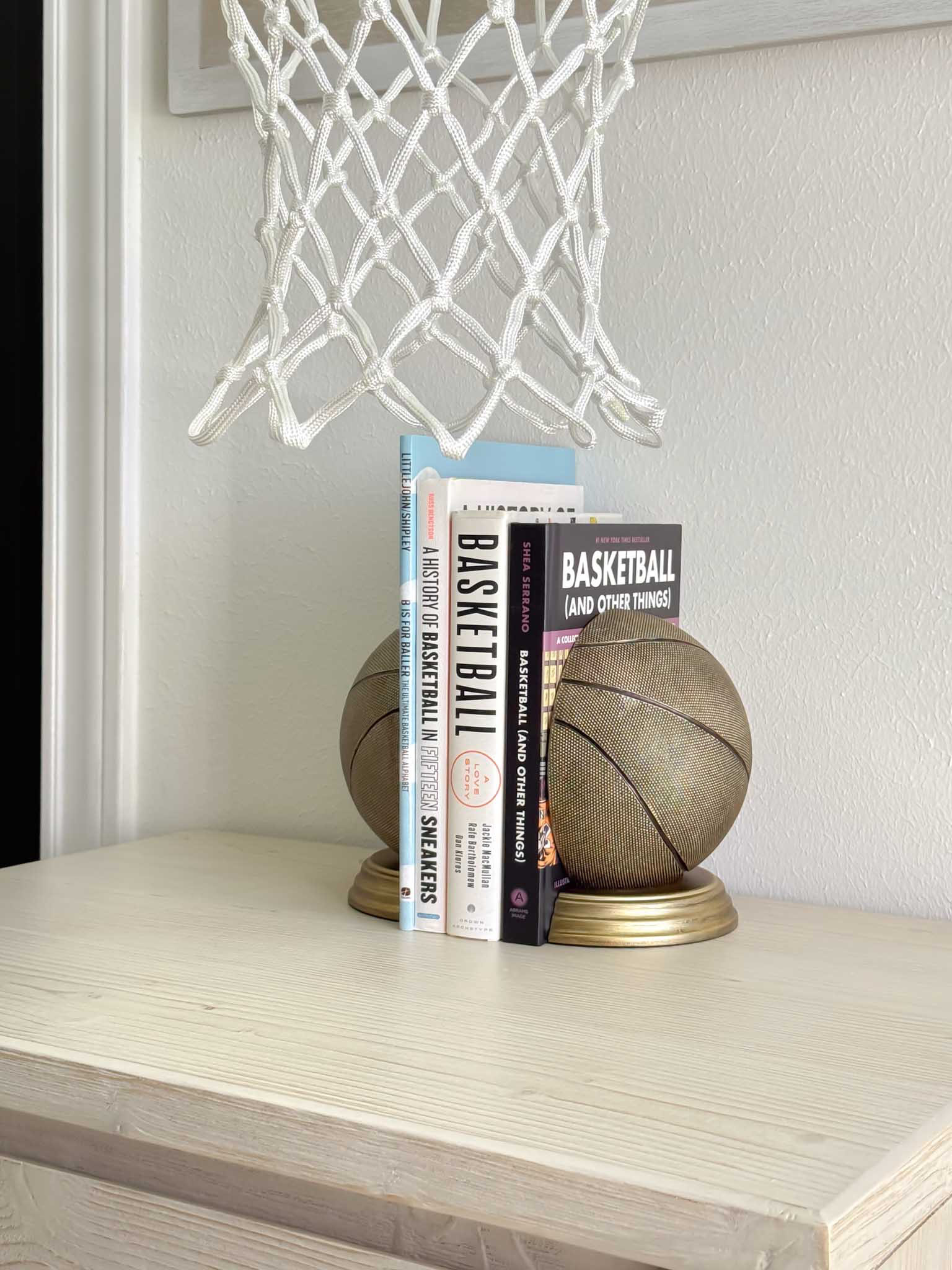Sterling's Room Makeover!
These bronze basketball bookends, are ideal for holding all the basketball books that Sterling enjoys browsing through. 

 #LTKHome #LTKFindsUnder50 #LTKKids