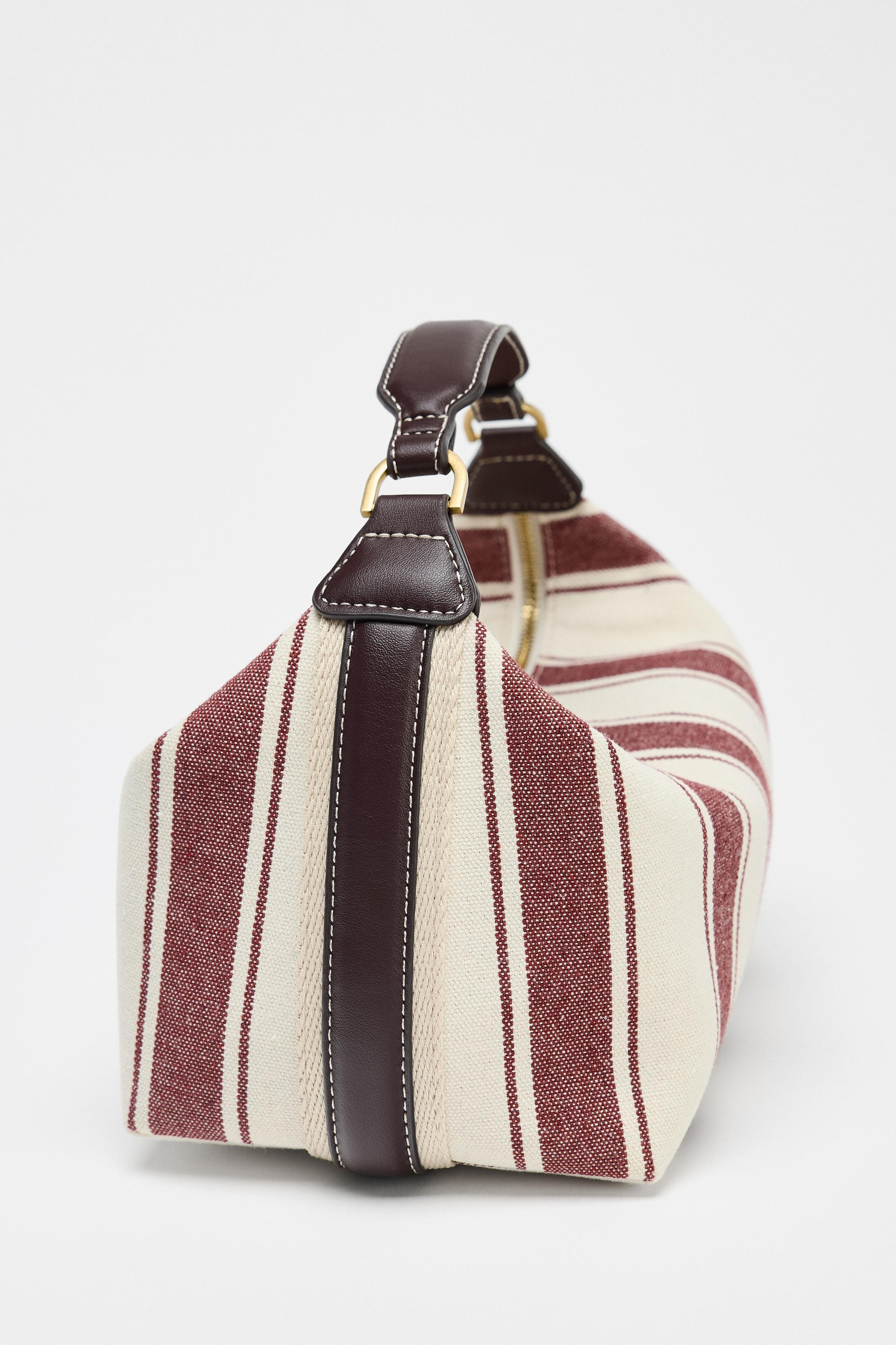 Striped fabric city handbag. Double detachable shoulder strap in contrasting fabrics. Metal detai... | Zara UK