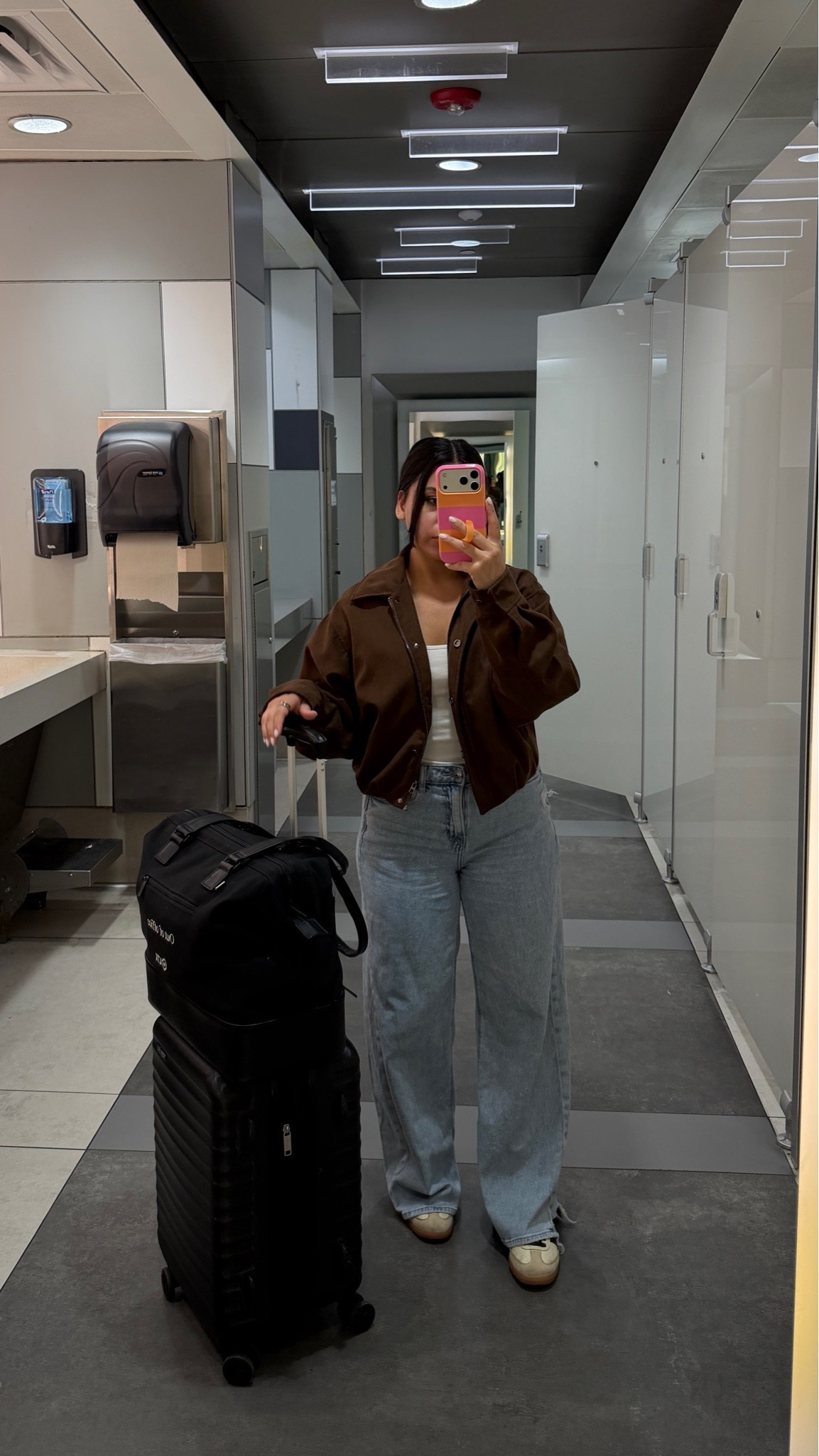 Tank: small
Jacket: similar 
Jeans: 2 short 
Sneakers: 4.5 men 
Carry on luggage 
Weekender bag 
Travel outfit 
Airport outfit

#LTKgrwm #LTKootd #LTKTravel