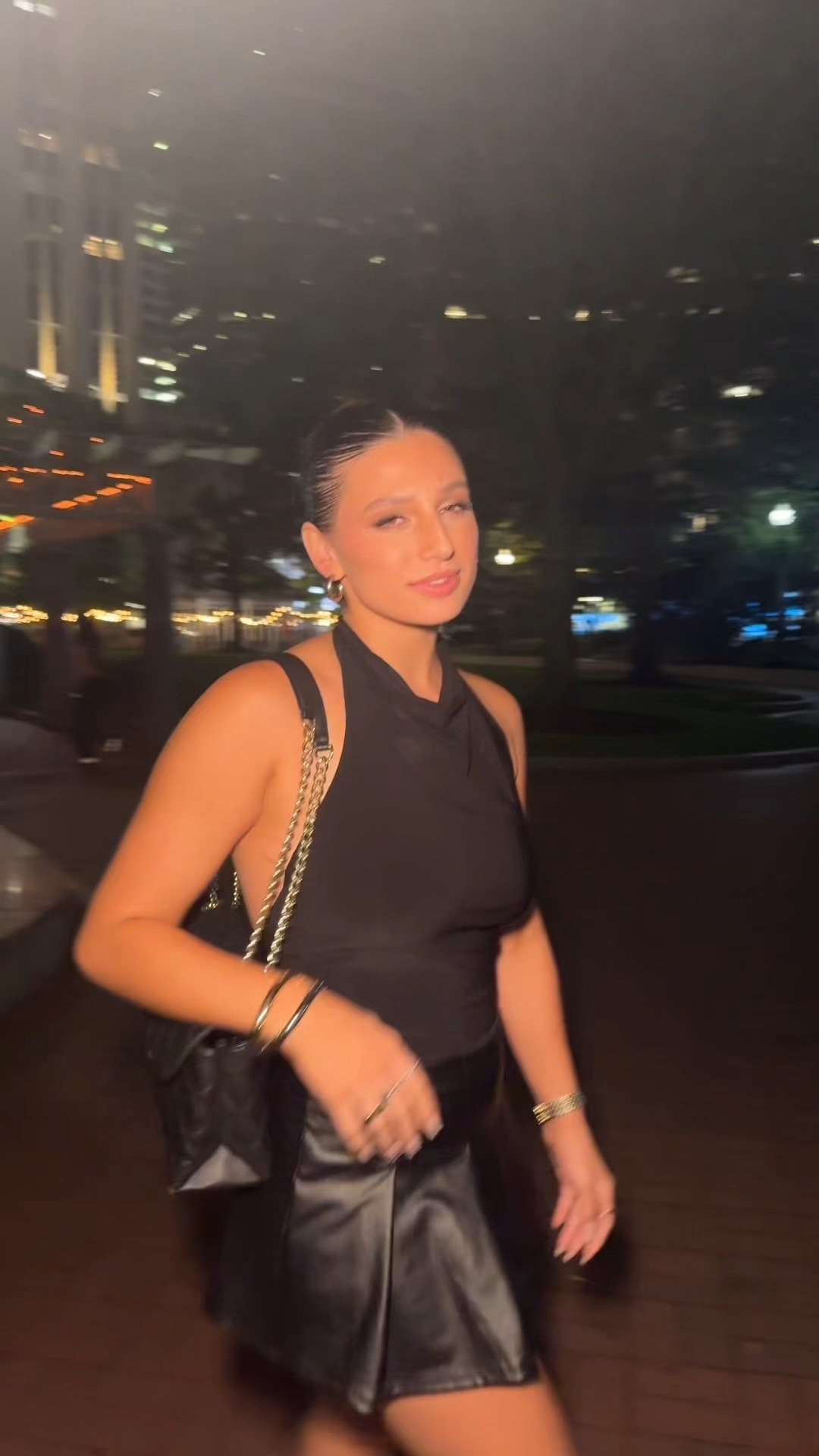 Wearing a sleek black halter top with a leather mini skirt for the ultimate girls’ night out look. This all-black outfit is chic, timeless, and easy to dress up with gold jewelry, strappy heels, and a statement bag. Perfect for a date night, cocktail hour, or city night out. Shop my full look — from elevated going-out tops to satin skirts and night-out accessories. #NightOutOutfit #DateNightStyle #LTKfashion #CityStyle #AllBlackOutfit

#LTKStyleTip