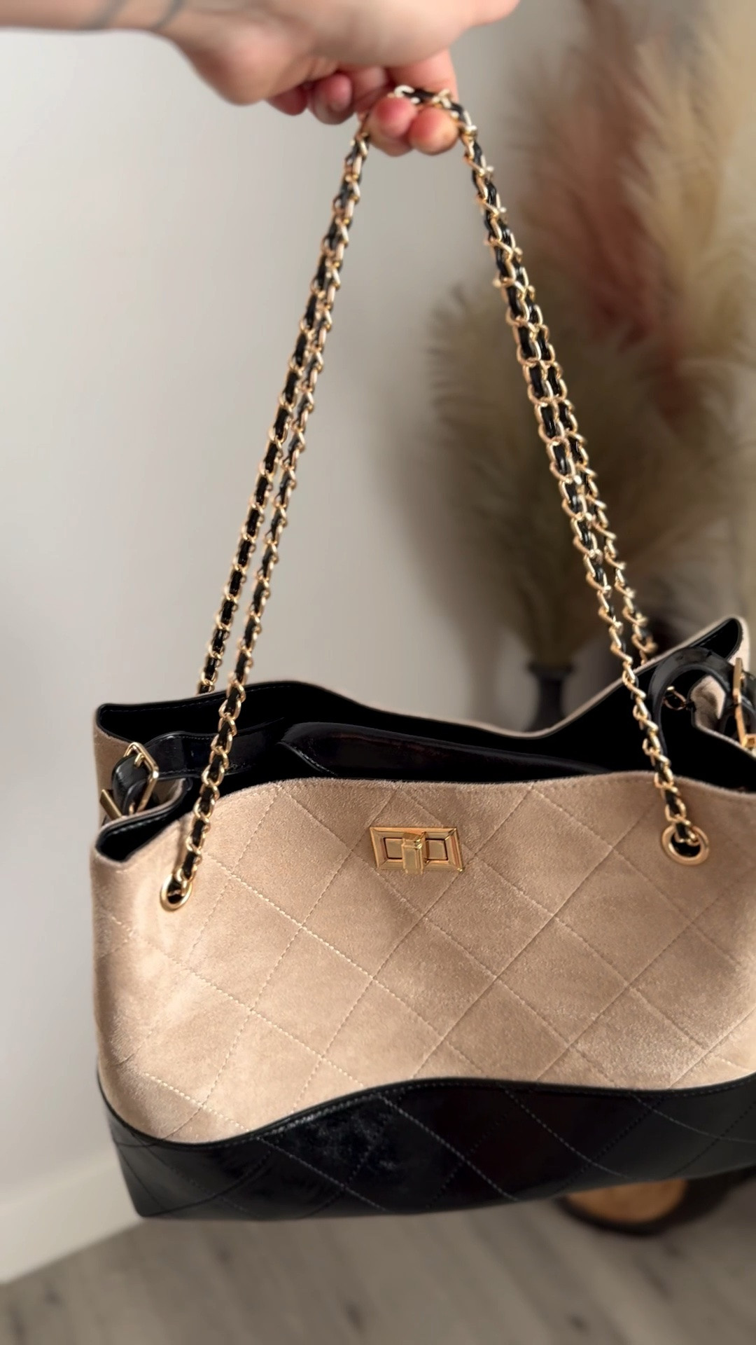Neutral, chic, and giving quiet luxury vibes. This two-tone quilted tote is the kind of bag that instantly elevates every outfit. The black + cream combo with gold chain details makes it look designer-inspired without the designer price tag. Perfect for work, travel, errands, or your everyday “throw everything in and go” bag. Obsessed with how classy and versatile this one is! 

#LTKStyle #LTKItBag #NeutralStyle #QuietLuxuryStyle #EverydayBag #ToteBagStyle #FashionFinds #ChicStyle #AffordableLuxury #CapsuleWardrobe #StreetStyleFashion #MinimalStyle #DesignerInspired #BagObsession #OOTDInspo #ClassicStyle #ViralFashion #LTKUnder100 #ModernStyle #NeutralAesthetic #FashionInfluencer #TrendingNow #StyleInspo #LuxuryLookForLess #HandbagAddict

neutral tote bag • quilted tote bag • black and cream purse • designer inspired handbag • affordable luxury bag • everyday tote purse • chic work bag • trendy handbags 2026 • quiet luxury accessories • gold chain tote • neutral handbag outfit • classy tote bag • large everyday purse • modern fashion accessories • capsule wardrobe bag • stylish tote for women • urban expressions tote • eliana tote • minimalist handbag • work tote aesthetic @Urban Expressions

#LTKootd #LTKvlog #LTKU