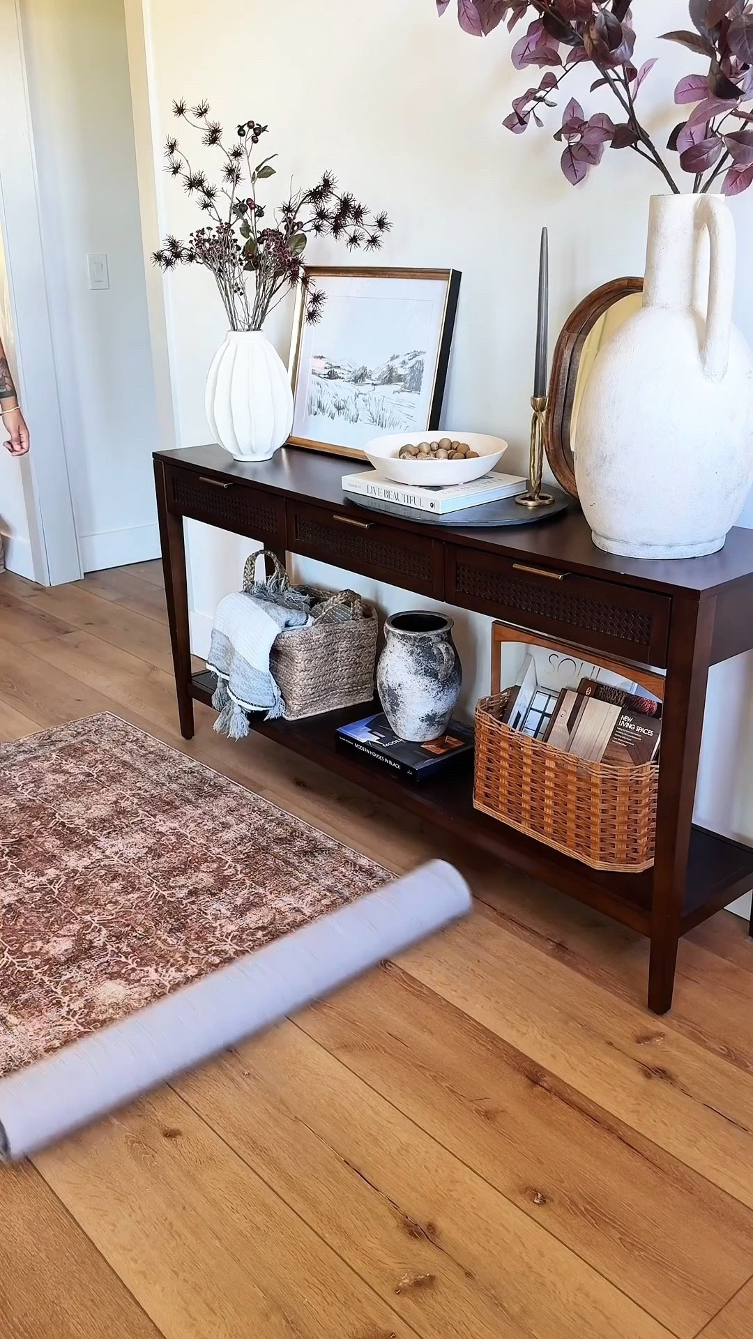 Sometimes all a space needs is one good piece of color.

This rusty red neutral runner rug instantly warmed up my entryway and looks so good layered in front of my walnut console table. It adds just enough contrast to my neutral decor while still keeping the space calm and cohesive.

Proof that a simple entryway rug can completely transform a space.

#LTKHome #LTKAmazonFinds #LTKEntryway

#LTKHome #LTKSaleAlert #LTKSeasonal