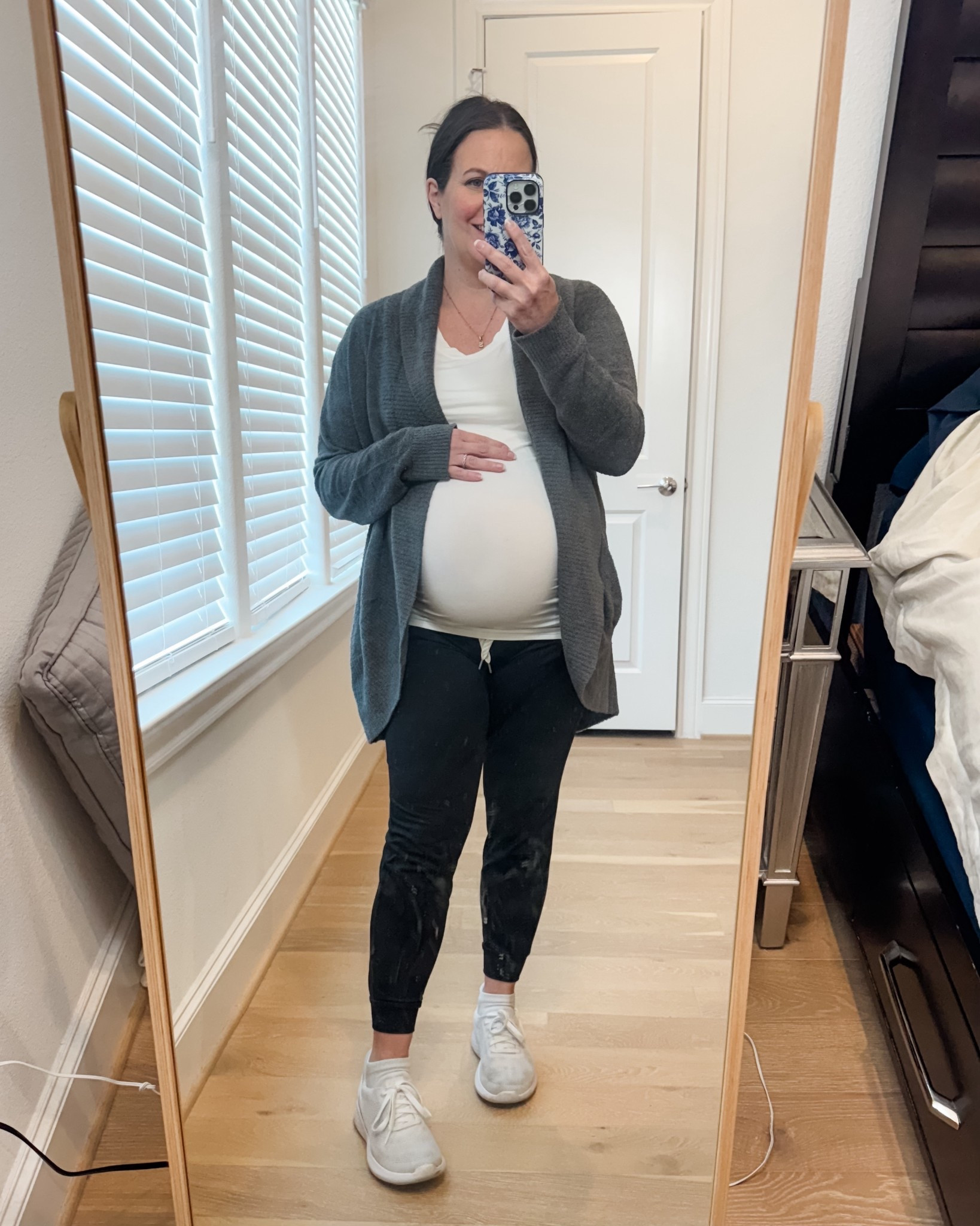 Lived in this comfy outfit during pregnancy —especially on cold days when I want to feel put together but cozy. This maternity outfit is the perfect loungewear look, featuring a soft gray cardigan sweater layered over a white maternity tee and paired with comfortable black joggers pants. The jogger pants are part of the LTK spring sale!

I finished the look with white slip on sneakers for an easy, casual vibe that still works for errands or coffee runs. If you’re looking for comfy and cozy outfits for cold days, this is such a great pregnancy-friendly option that you’ll reach for on repeat all season long.

Everything is linked below so you can recreate this cozy maternity look 




#LTKBump #LTKSeasonal #LTKSpringSale