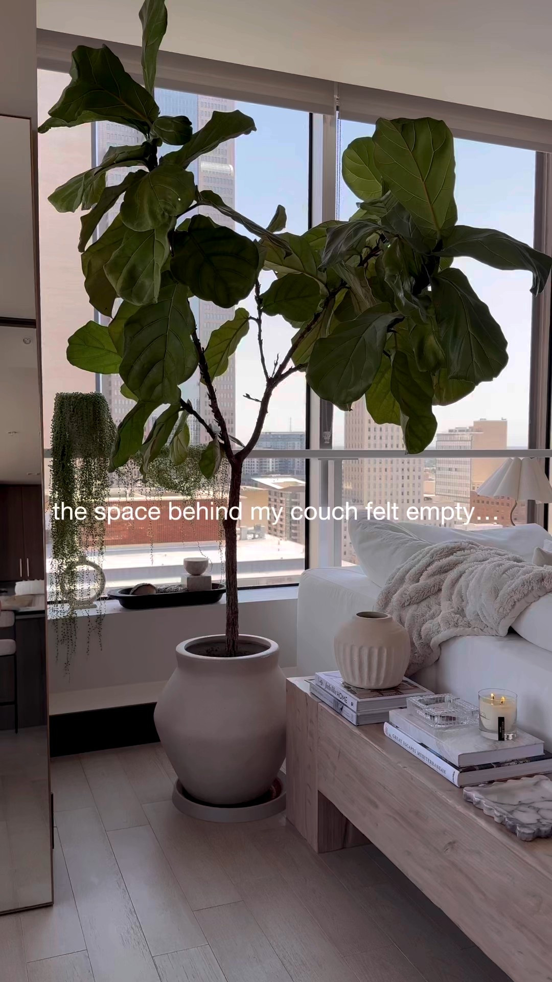 Watch the whole reel to see a cutie visitor. 🥰🐶

This little corner was giving… nothing. So I added a custom bench, styled it up, and now it’s one of my favorite moments in the room 🕯🤍 For those who are curious, the sectional is the @Sundays movie night couch. It’s my RH cloud couch dupe! 

What's your favorite little detail in this vignette? 
.
.
.
.
.
#InteriorStyling #CozyVibes #StyledSpaces #MorganPageDesigns #HighRiseLiving #DallasHighRise #CozyDetails #MarbleAccents #DallasInteriorDesigner #DallasHomes #Interior Design #Pomsky 

#LTKFindsUnder100 #LTKPets #LTKHome