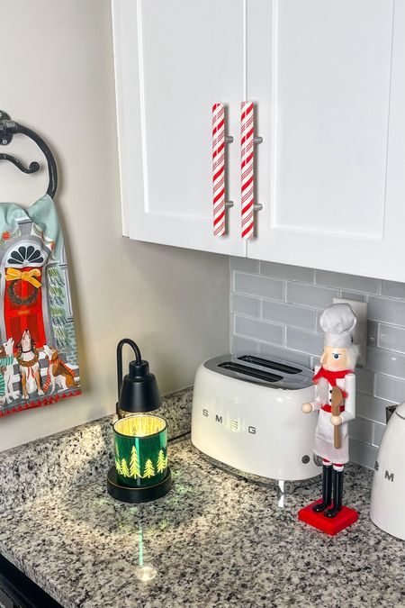 Christmas kitchen, Smeg toaster, Smeg kettle, candle warming lamp 

#LTKhome #LTKHoliday