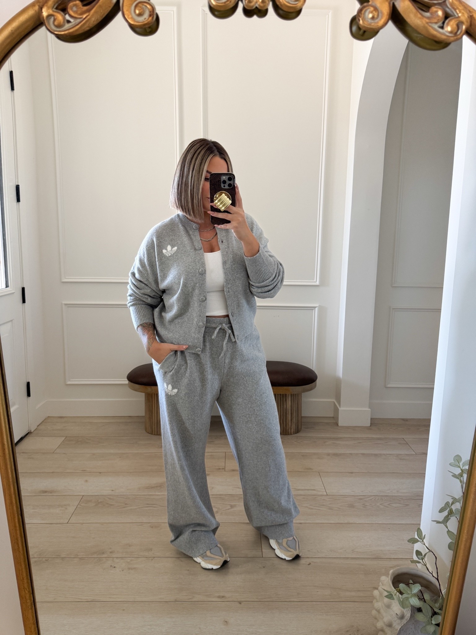 Loveee this set. I mainly wanted the cardigan cuz I know I will style this so much this fall/ winter but had to grab the pants too because I love a good set. Mix and match these pieces with other stuff in your closet. 

Cardigan  L 
Pants XL they are nice a long. I’m 5’5 and they are plenty long on me with a chunky sneaker I would say size up in the pants for a relaxed fit. 

Grab it now because their stuff sells out extreamly fast ! 

#adidas