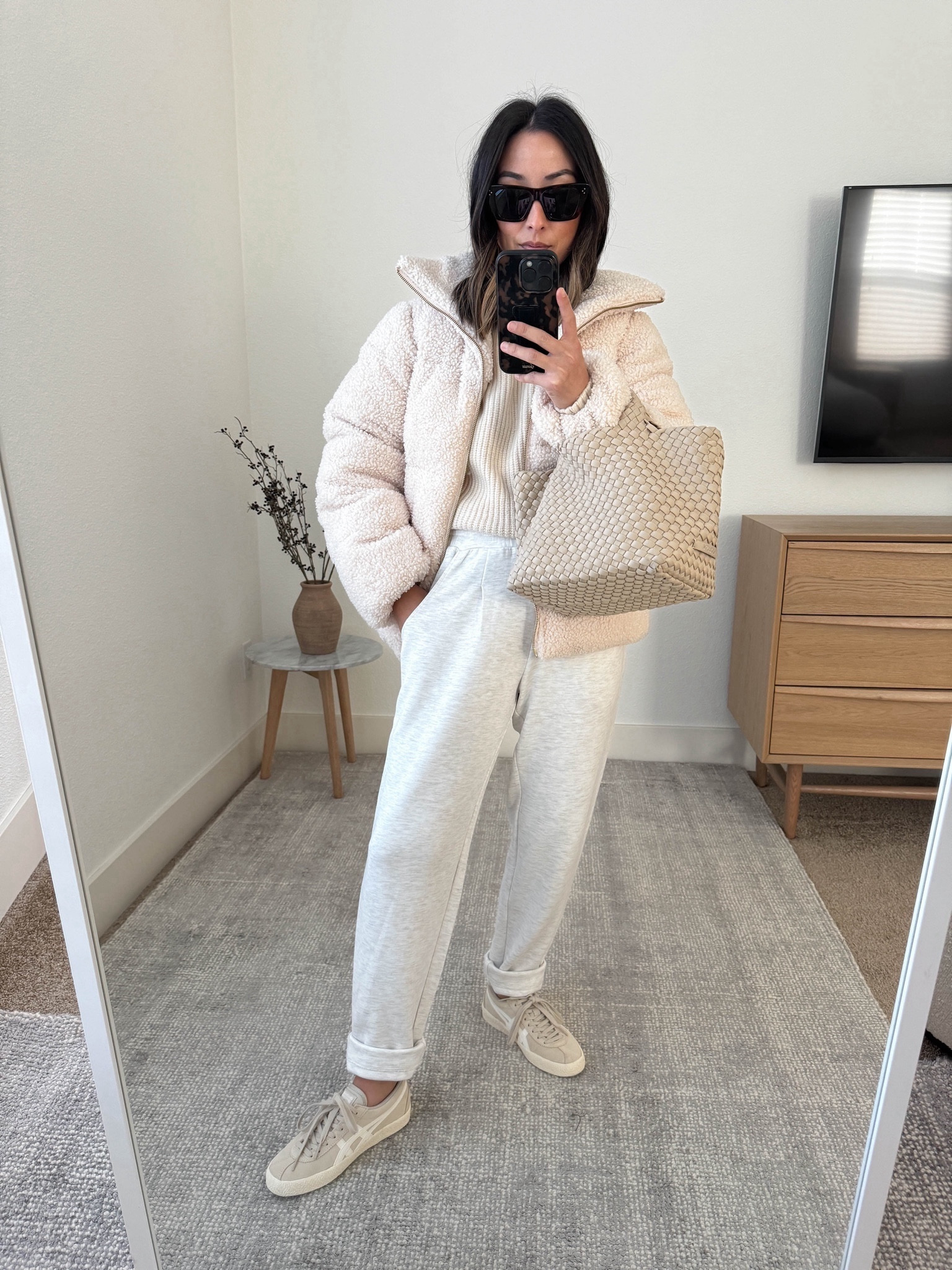 Varley outfits. Travel outfits. Leisure outfits. New cuff pants are more casual and less sporty. Jacket is 
Very warm and puffy. I sized down but it’s a little snug so go tts. 

Varley jacket xxs 
Varley sweater xs
Varley pants 25” xs
Onitsuka sneakers 4 men’s 
Naghedi mini ecru
Celine sunglasses  

#LTKtravel #LTKshoecrush #LTKitbag