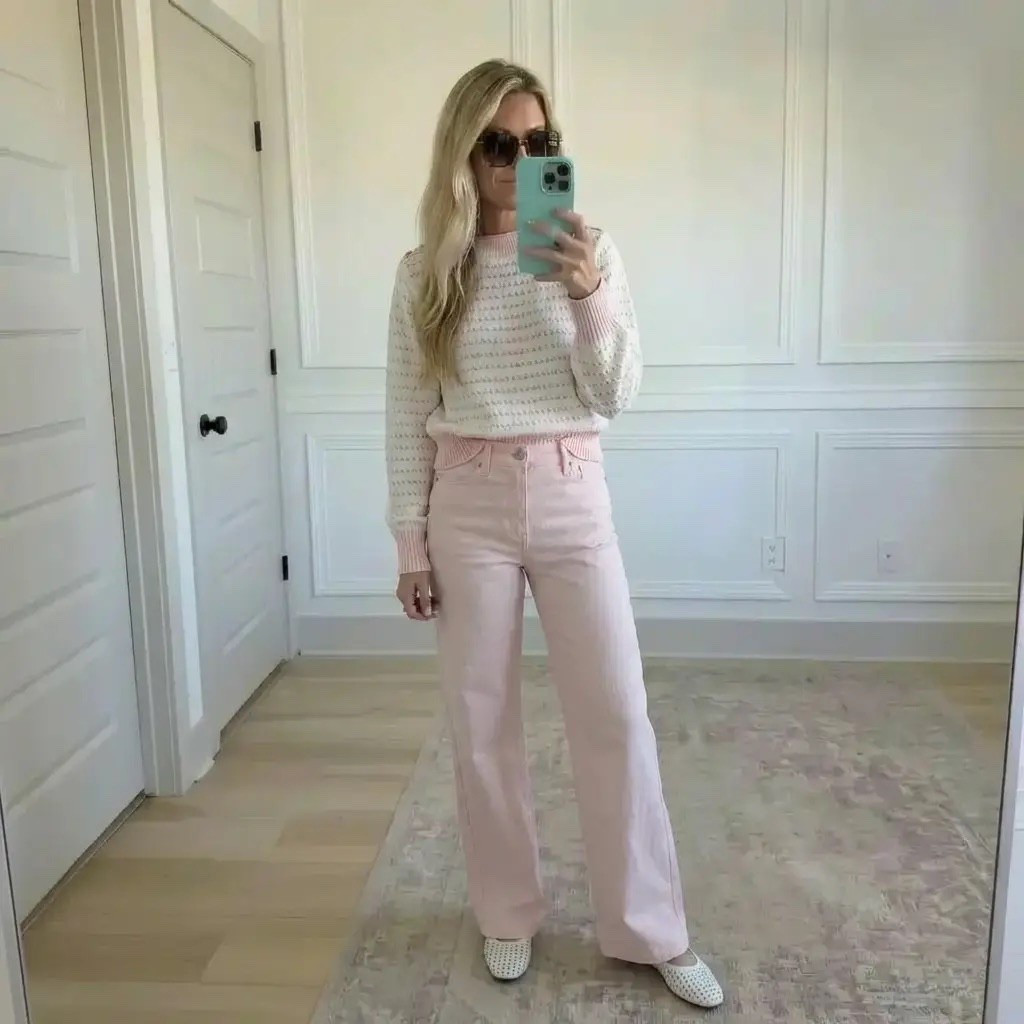 Soft neutrals and blush tones come together in a light-filled, paneled room. A blonde woman captures a mirror selfie wearing a delicate knit sweater with subtle texture, paired with relaxed blush wide-leg pants. Finished with airy white slip-ons and oversized sunglasses, the look feels feminine, modern, and effortlessly polished. Gentle color, cozy textures, and clean lines create a calm, elevated everyday aesthetic.

Hashtags
#SoftNeutrals #BlushStyle #EffortlessChic
#EverydayElegance #CozyAndChic
#WideLegPants #ModernFeminine
#QuietLuxury #NeutralAesthetic
#MirrorStyle #CasualPolished
#SimpleOutfit #StyleInspo

#LTKgrwm #LTKValentine #LTKdayinmylife