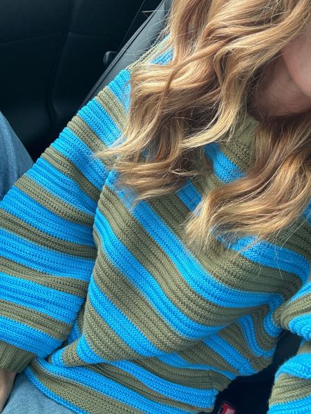 Loving this @freepeople sweater, the colors are so cute! I got my regular size, you could size down for less of an oversized look. 

#LTKstyletip