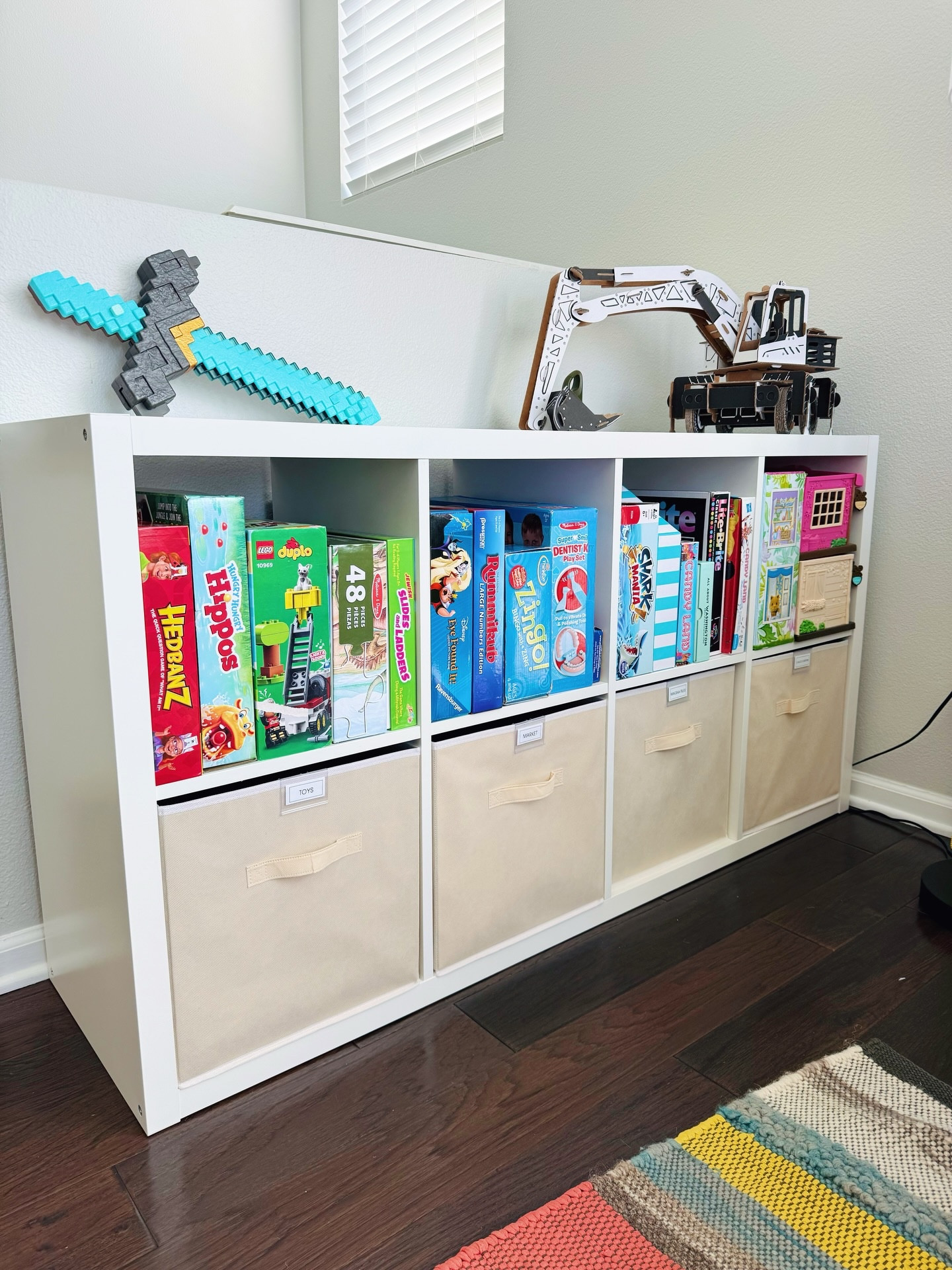 Toy zone transformed!🧸🪀 So many of our clients are parents who have a living room space with toys that are taking over. We gave our client an organized space for their child’s toys to live, without so much of the visual clutter!

Storage cubes are the ultimate storage solution for open play areas like this! Our hack is to micro sort with clear bins inside the cubes to give even more categorization.

SWIPE FOR THE BEFORE➡️

#toyorganization #playroomorganization #kidsorganization #spacesbyemily #losangelesorganizer