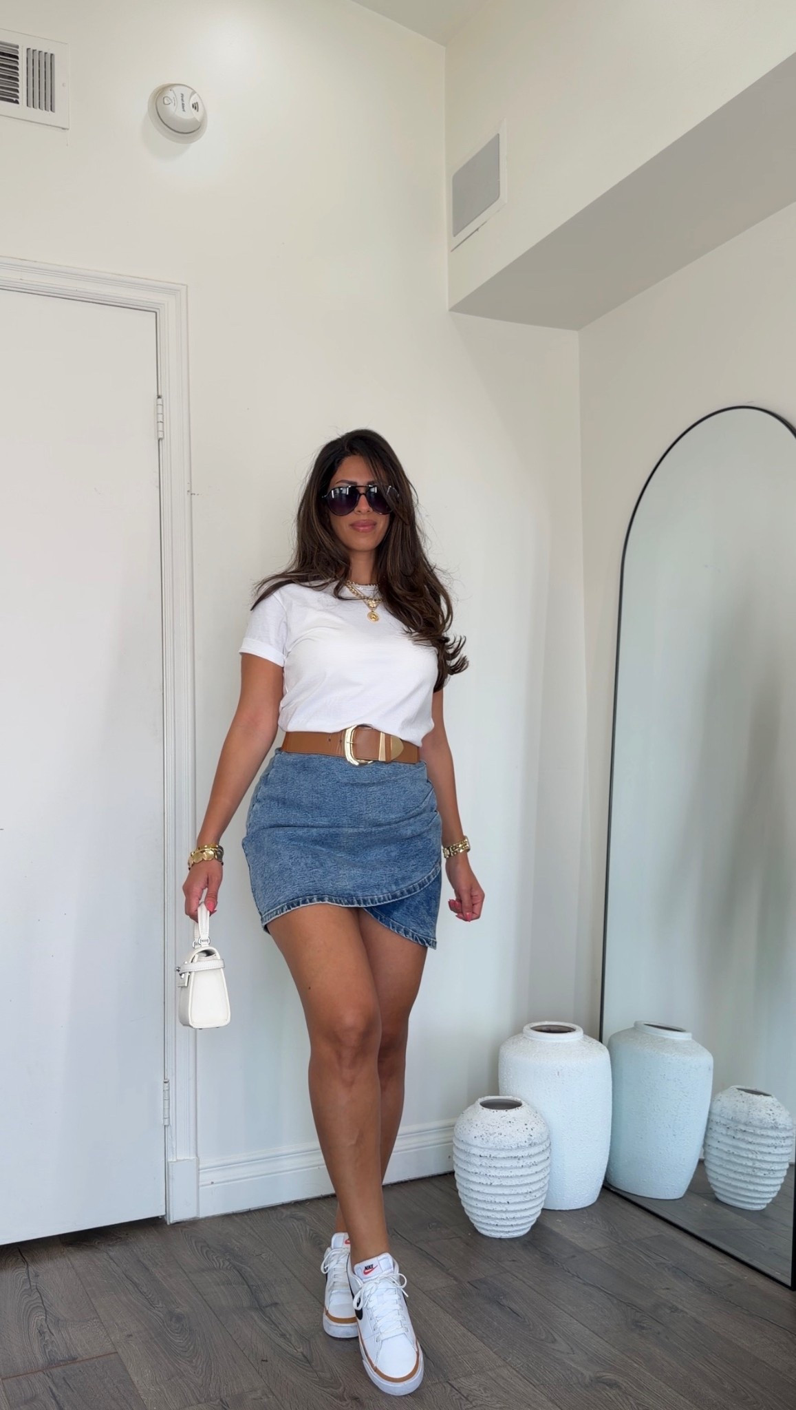 Basic spring outfit idea with a tee and denim skirt! Size medium in the tee (comes in two pack), size small in the skirt! 

#LTKSeasonal #LTKMidsize #LTKootd