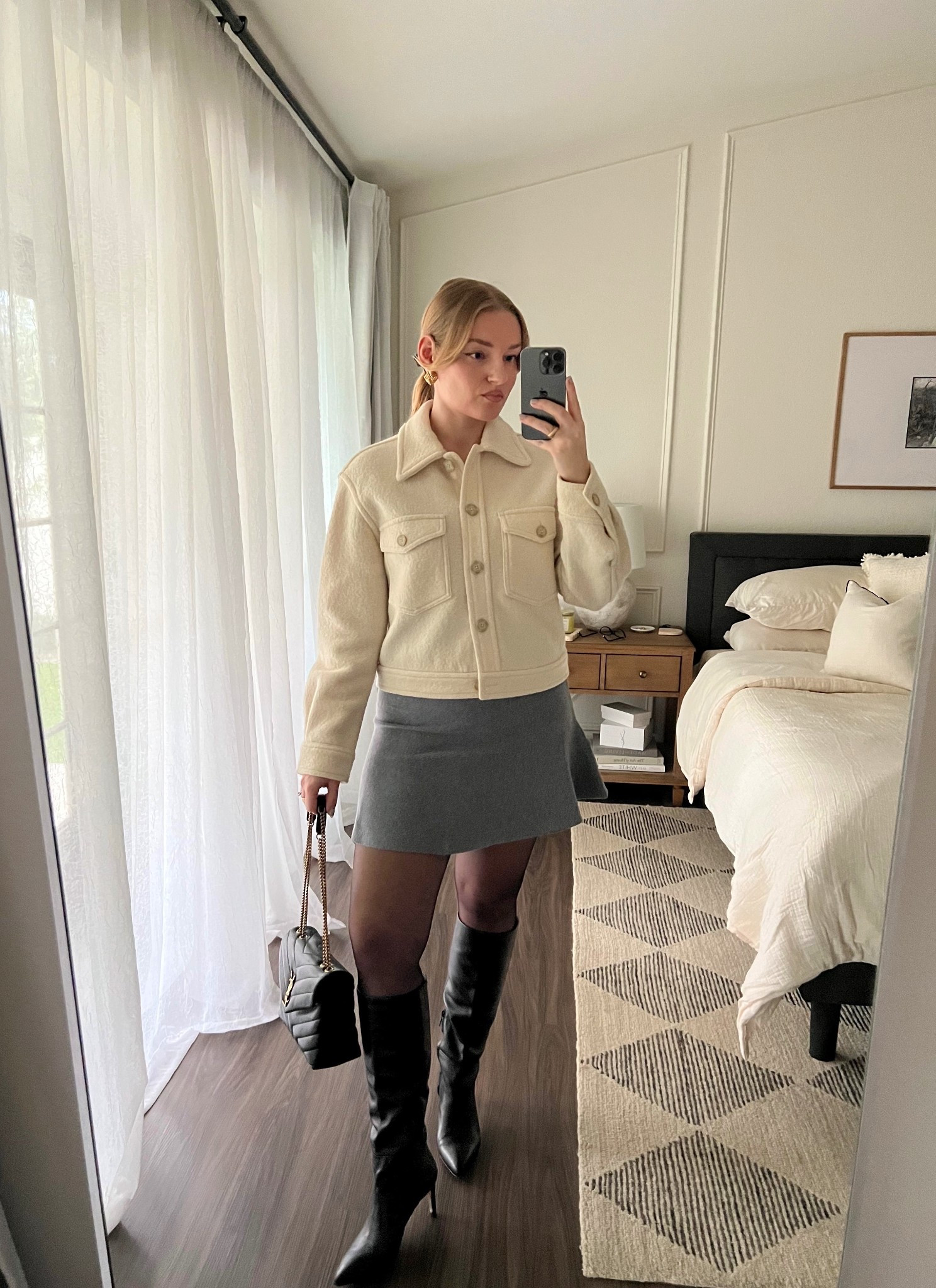 Cream jacket and grey mini skirt with knee high boots

#LTKWorkwear
