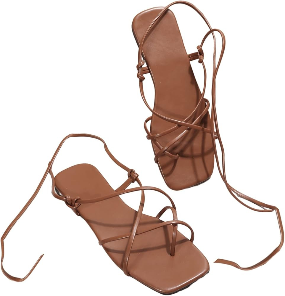 GORGLITTER Women's Lace Up Strappy Toe Ring Flat Sandals Tie Leg Leather Sandals | Amazon (US)