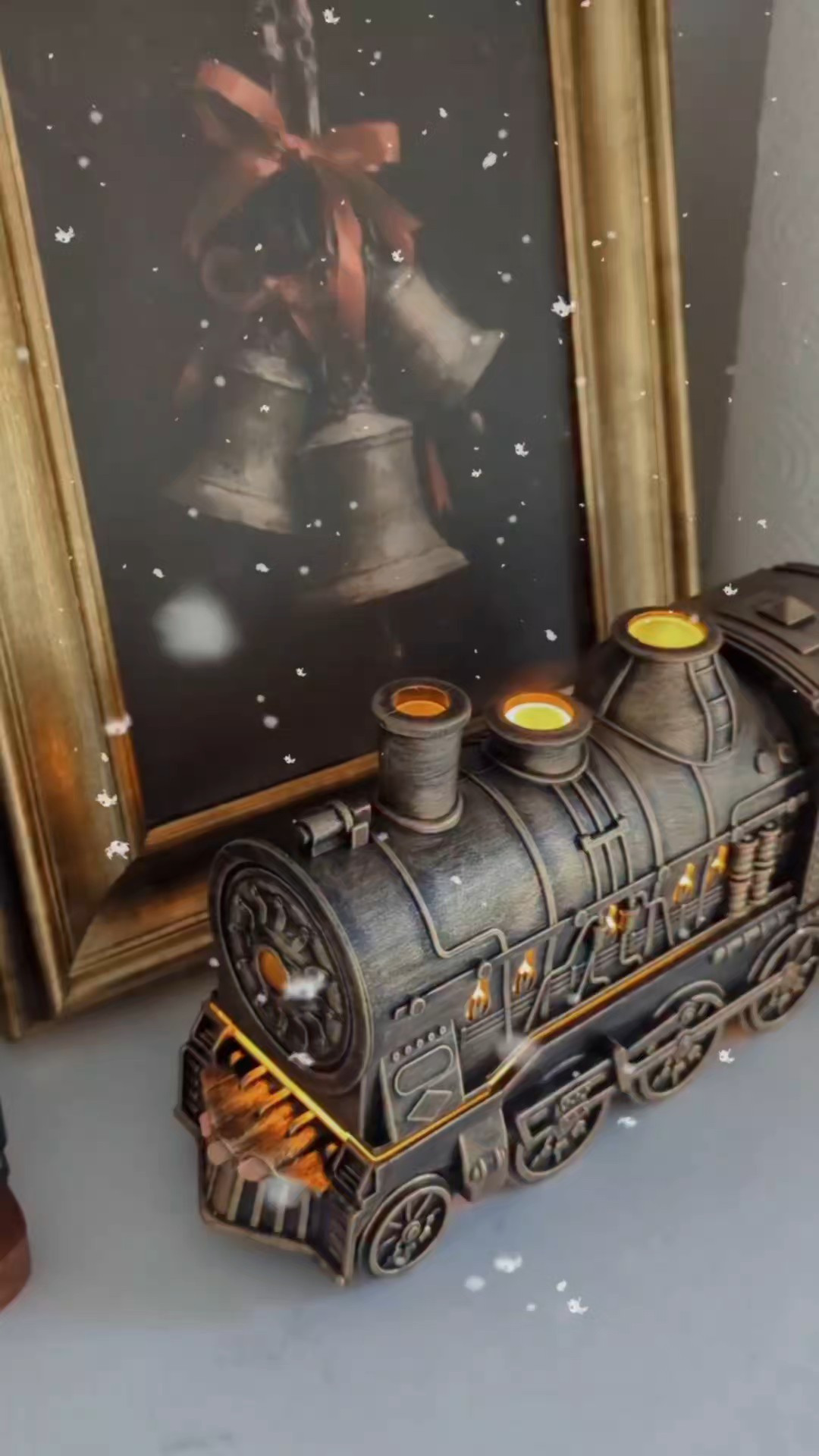 Kitchen Christmas decor with a touch of Hogwarts. Harry Potter Christmas decor. Steam train diffuser. Viral train. Gold train decor. Bells art from Etsy. Printable art. Harry Potter candle carousel. Cedar stems. Berry stems. Cedar swag. Burgundy ribbon. Wine red velvet ribbon. DIY chair swags with red ribbon and gold bells. #Christmas #LTKfind

#LTKHoliday #LTKSeasonal #LTKHome