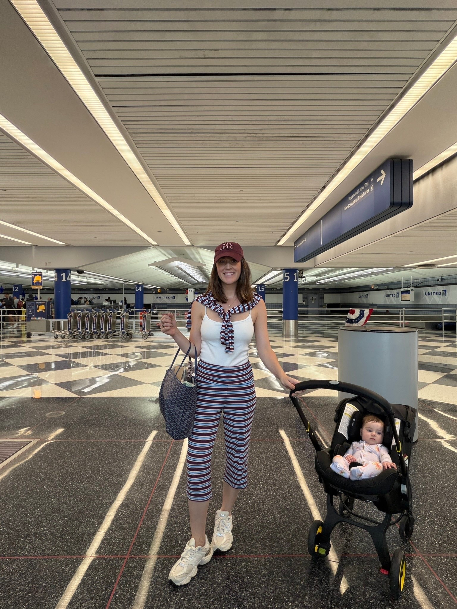 Travel OOTD! This @Target set is so cute, wearing the cardi around my shoulders but also looks cute worn together! Fits TTS. My Goyard bag is borrowed, use my Vivrelle code CHICTOME for first month free