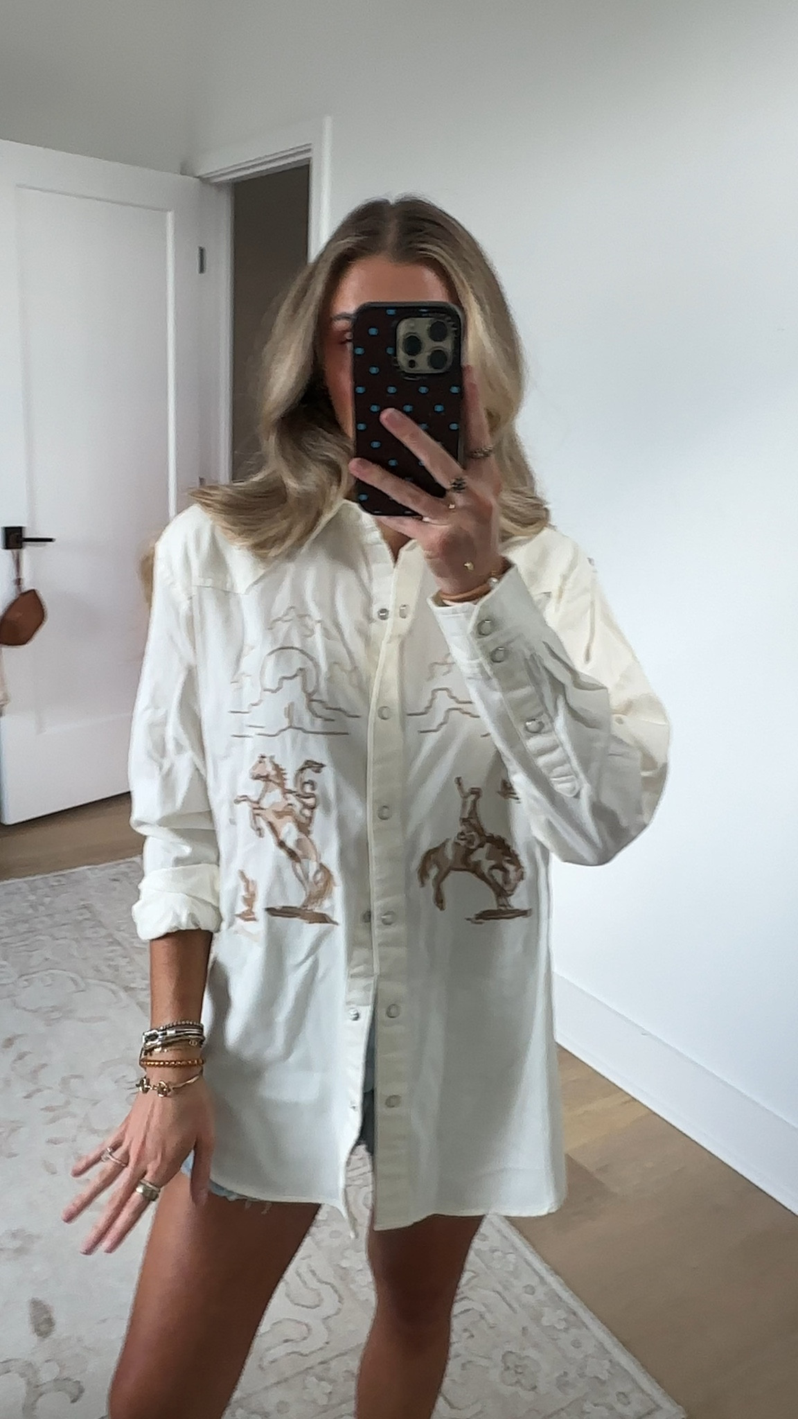 @Wrangler size small This Women’s Wrangler Retro® Embroidered Boyfriend Western Snap Denim Shirt pays tribute to the time-honored tradition of horse training and rodeo. It features embroidered artwork of a bronc rider in a round pen on one side and a cowboy riding a rearing horse on the other side, with mountains in the distance. This lightweight denim shirt is crafted from 100% cotton and finished with pearl snaps for an authentic cowgirl look. Best of all, its boyfriend fit offers that broken-in feeling right from the start.

#LTKFestival #LTKSeasonal #LTKootd