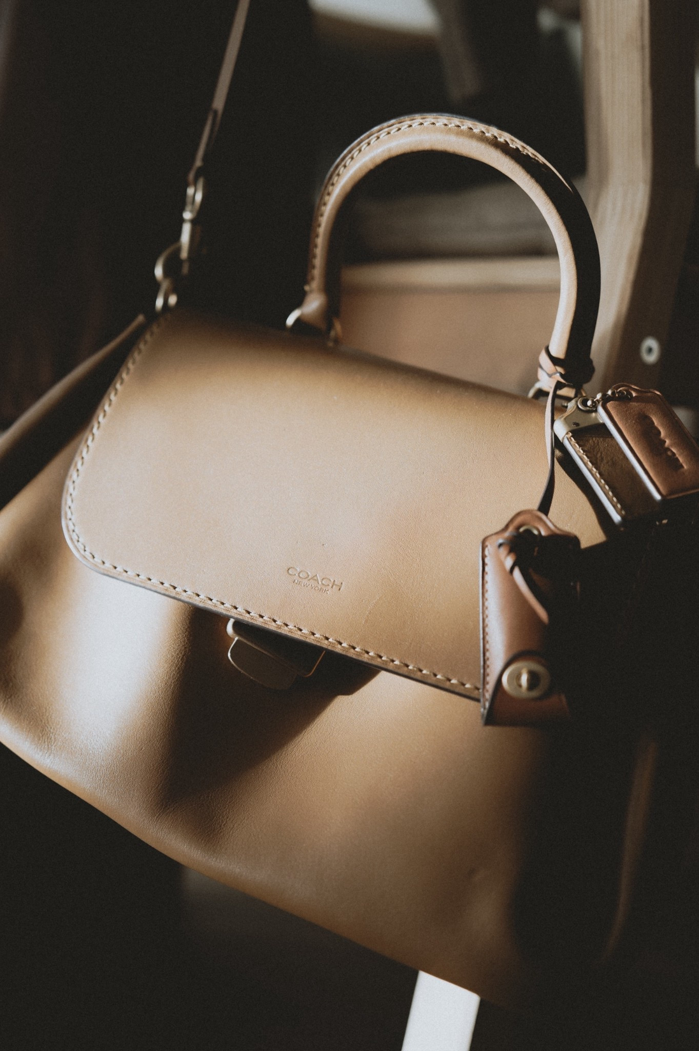 In my Rogue era 🥰
Coach Slouchy Rogue Top Handle Bag in honey brown (mostly sold out right now from what I can tell) but I found one in black on Amazon and a few more at Dillard’s! 🏃‍♀️ 

#LTKSeasonal #LTKItBag #LTKWorkwear