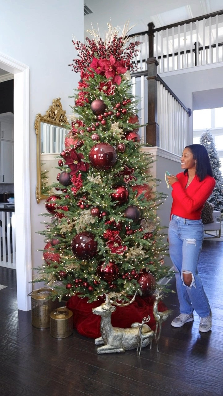 Loving this burgundy tree in my foyer. It is the viral twinkling tree and I went with oversized ornaments instead of using ribbon here 

#LTKSeasonal #LTKHome #LTKHoliday