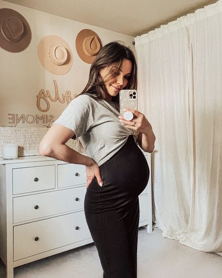 This maternity dress comes in two colors, is a great layering piece and feels SO soft on. For just $35 this is a great deal too!

I tied up a cropped tee for a more flatting “bump” silhouette, but the key is long loose sleeves for that effortless, flatting fit.  

#LTKbump