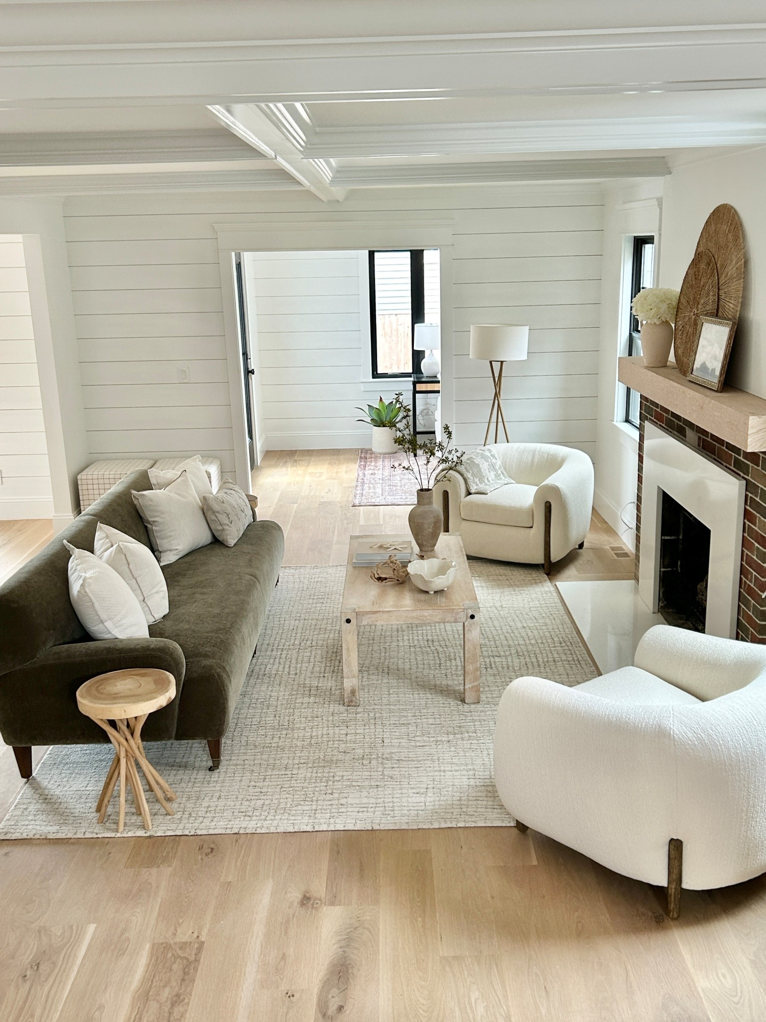 Living room styled with greens and cream.

#livingroom 

#LTKHome
