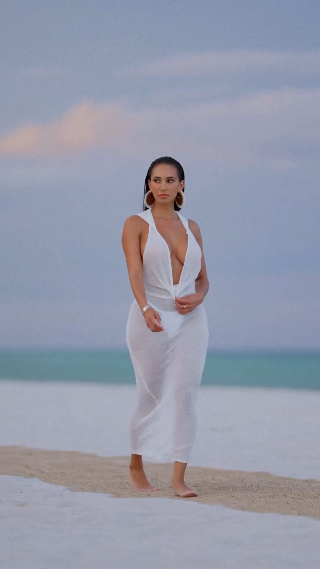 Delicate and enchanting, this cover-up adds a touch of elegance to your beach ensemble. Perfect for lounging by the pool or strolling along the sandy shores, it effortlessly drapes over your swimsuit, allowing you to showcase your style while maintaining a hint of mystery. Let the soft, sheer fabric caress your skin, creating a dreamy and romantic vibe. Elevate your beach look with this captivating piece, exuding grace and sophistication with every step.

#LTKswim #LTKbeauty #LTKSeasonal