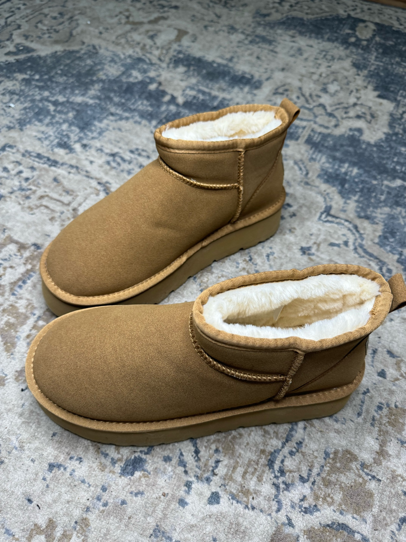 Designer inspired mini booties / UGG Classic Mini Platform Womens Boot / #looksforless #winterboots 



#LTKstyletip #LTKshoecrush #LTKsalealert