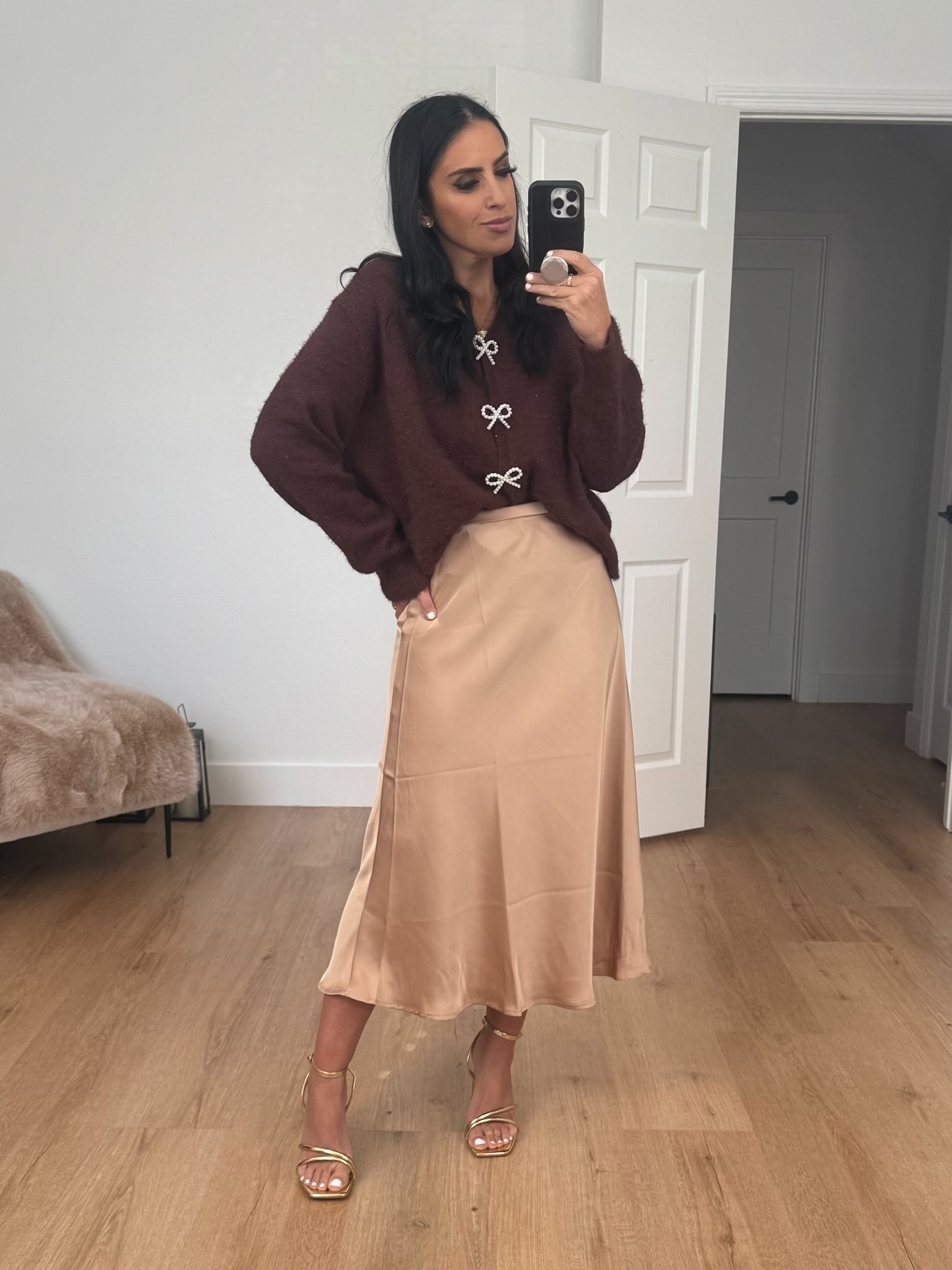 Satin Skirt Flowy A Line wearing size medium. Long Sleeve Knit Cardigan Bow Buttons wearing size small. 