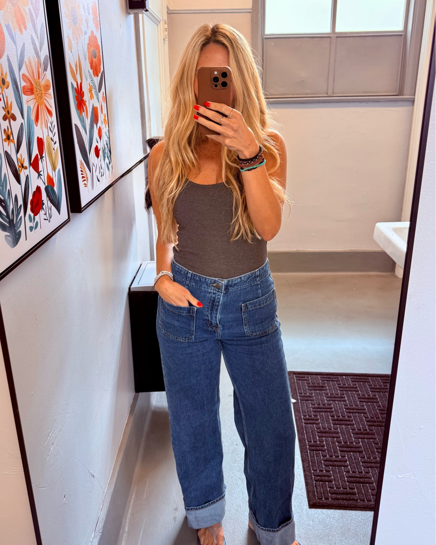 Loving these new Old Navy jeans ✨ High waisted and loose though the legs - super comfortable and easy to tuck my tanks bc of the high waist. Add these to your bag and grab when they go on sale!

Tank and jelly sandals are also Old Navy 🫶