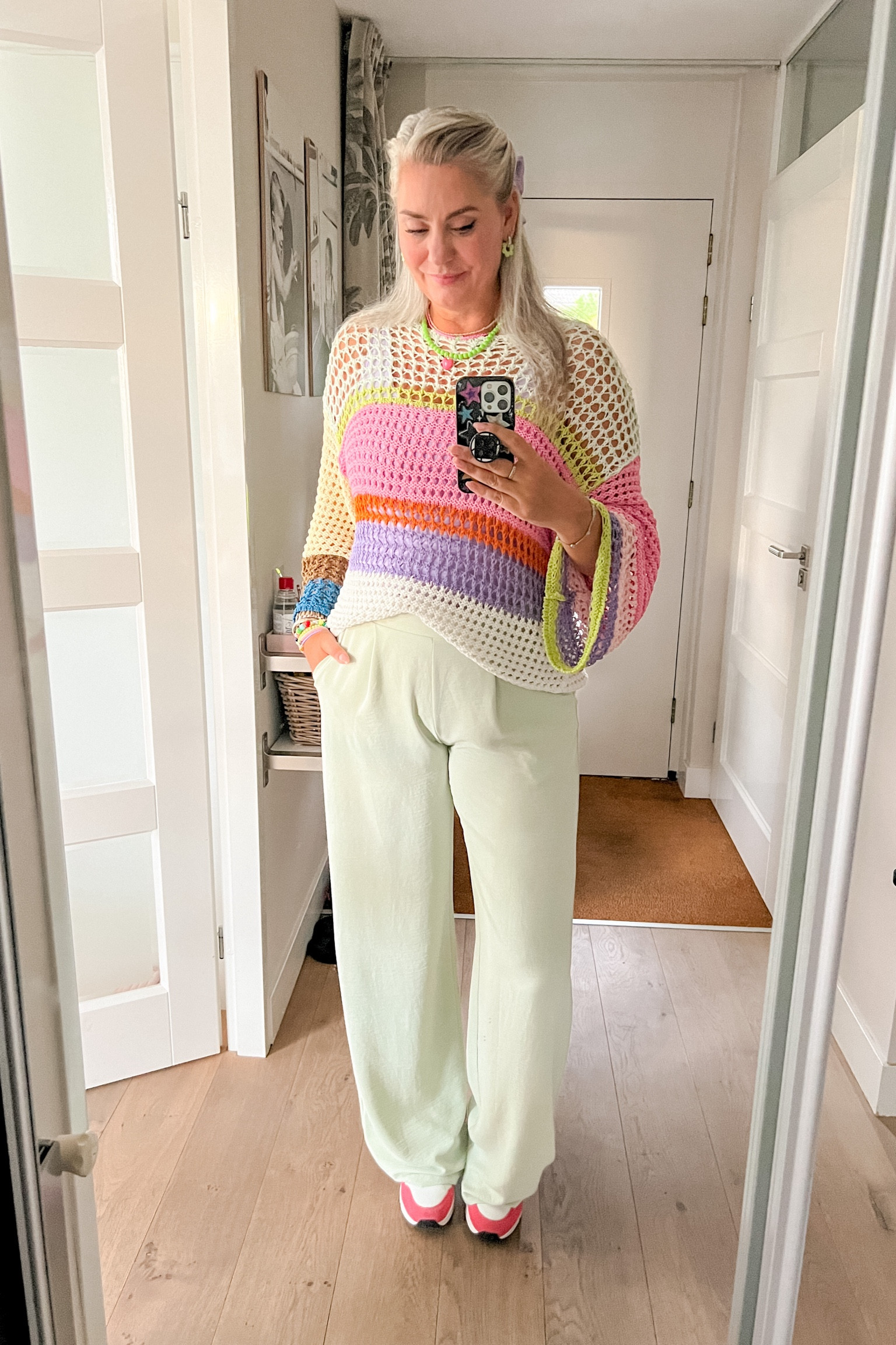 Ootd - Monday. Multicolored crochet sweater over a lilac tanktop paired with sage green trousers (Most Wanted, L) and pink and orange Skechers sneakers. A lilac bow in my hair and pink and green necklaces. 

#LTKeurope #LTKstyletip #LTKmidsize