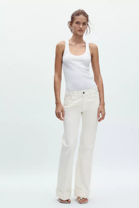 SLIM FIT - ROUND NECKLINE - NORMAL LENGTH - SLEEVELESSTank top made of spun cotton with a round n... | Zara UK