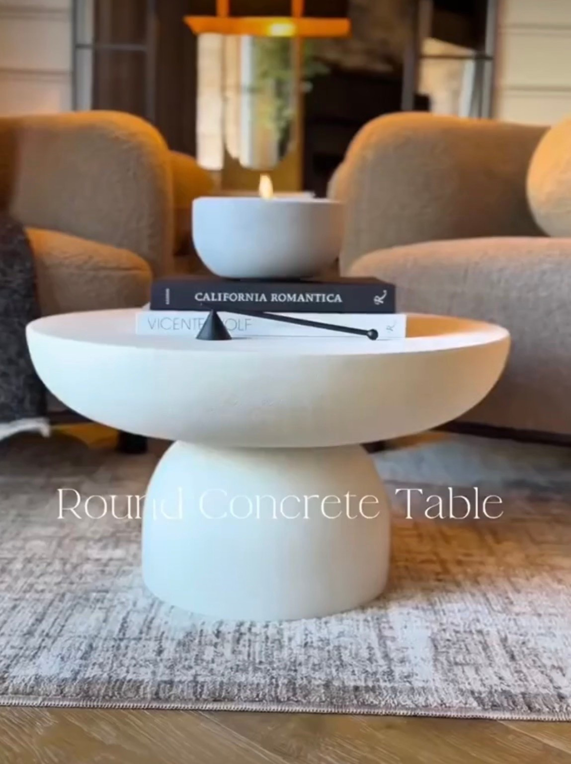 This table completely changed this little corner 🤎✨
I’ve been loving warm neutrals and sculptural pieces lately, and this rounded concrete table is the perfect mix of cozy + modern. I love how much character it adds while still feeling simple and timeless.

#LTKU #LTKSaleAlert #LTKHome