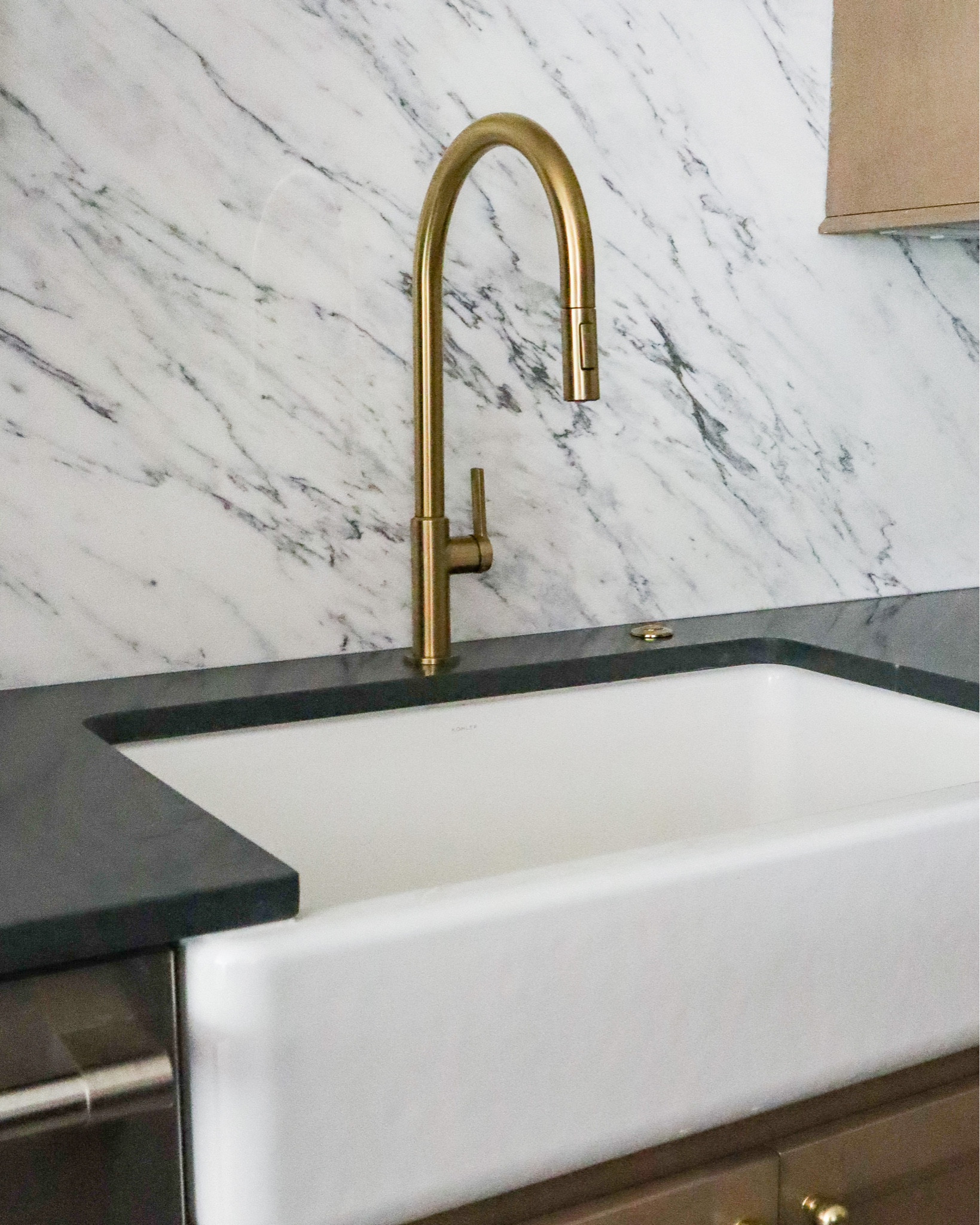 Our Kraus brushed brass kitchen faucet and Kohler Whitehaven apron front sink!

#LTKsalealert #LTKhome #LTKstyletip
