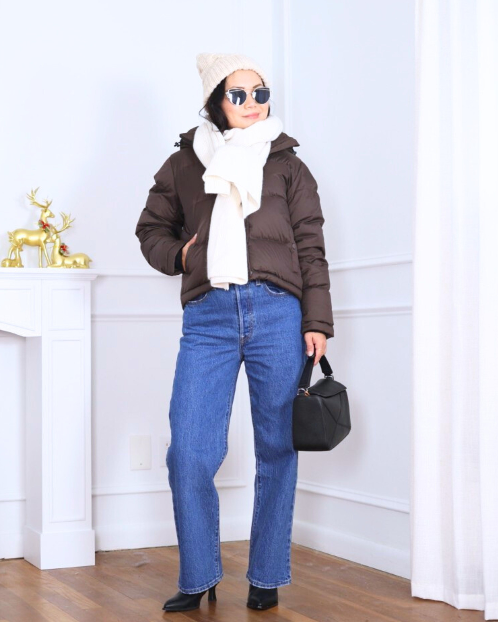 Cozy layers done right—Quince puffer jacket paired with Levi’s jeans, finished with booties, a beanie, and a cashmere wrap worn as a scarf for that effortless cold-weather chic. I’m 5’2, wearing size XS.

#LTKOver40 #LTKootd #LTKPetite