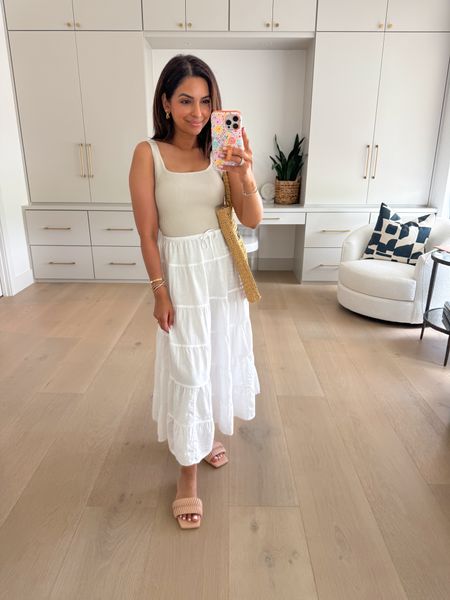 This linen skirt is a closet essential. I love pairing it with this tank from Aritzia! A simple but chic spring look. Wearing size XS in the skirt and S in the top!

#LTKFindsUnder100 #LTKSeasonal #LTKStyleTip
