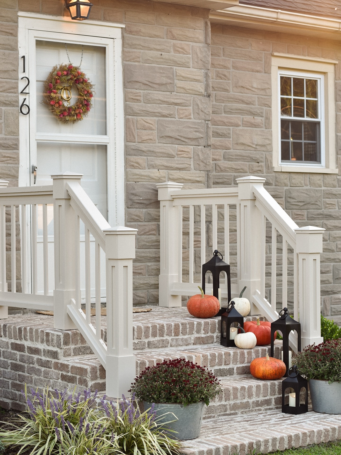 (9/24/25) 🍂✨ Fall on the front steps / front porch is my favorite season of all! I added cozy layers with a fall wreath, pumpkins, mums, lanterns, and warm autumn textures to make our entryway feel extra inviting. Decorating the porch for fall doesn’t have to be complicated - just a few seasonal touches can completely transform your home’s curb appeal.

If you’re looking for fall porch decor ideas, I’ve linked everything here - doormat, wreath, lanterns, and cozy accents, so you can create your own welcoming entryway! 🏡🍁 

 #LTKSeasonal #LTKHome #LTKFindsUnder100