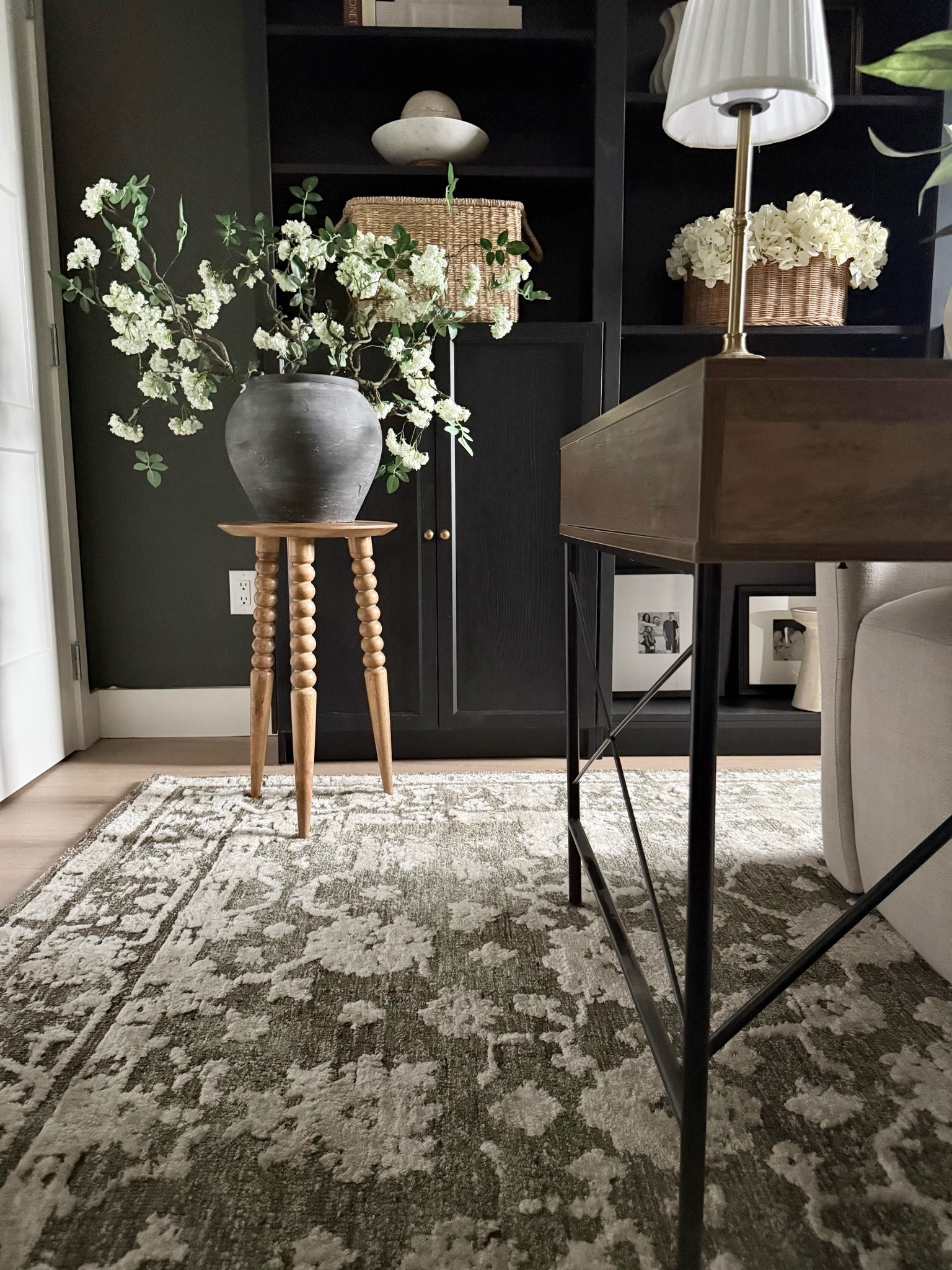 Moody floral rug. Love this touch of drama in our home office!