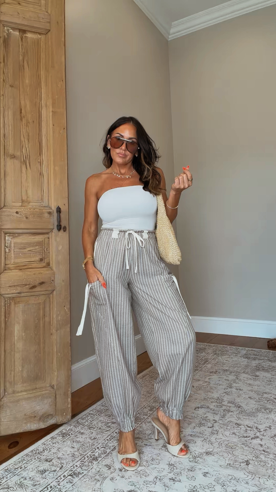 Tube tops after 40? Turns out the answer is yes. 🤍

This Amazon outfit feels like something you’d pack for vacation, but I’ve been wearing it for everyday life. The tube top actually stays put, the striped pants are lightweight and flattering, and the whole look gives effortless without sacrificing comfort.

Proof that getting dressed can be easy and still make you feel put together.

Wearing my usual XS/small.

#AmazonFashion #PetiteFashion #Over40Style #SummerOutfits #AmazonFinds