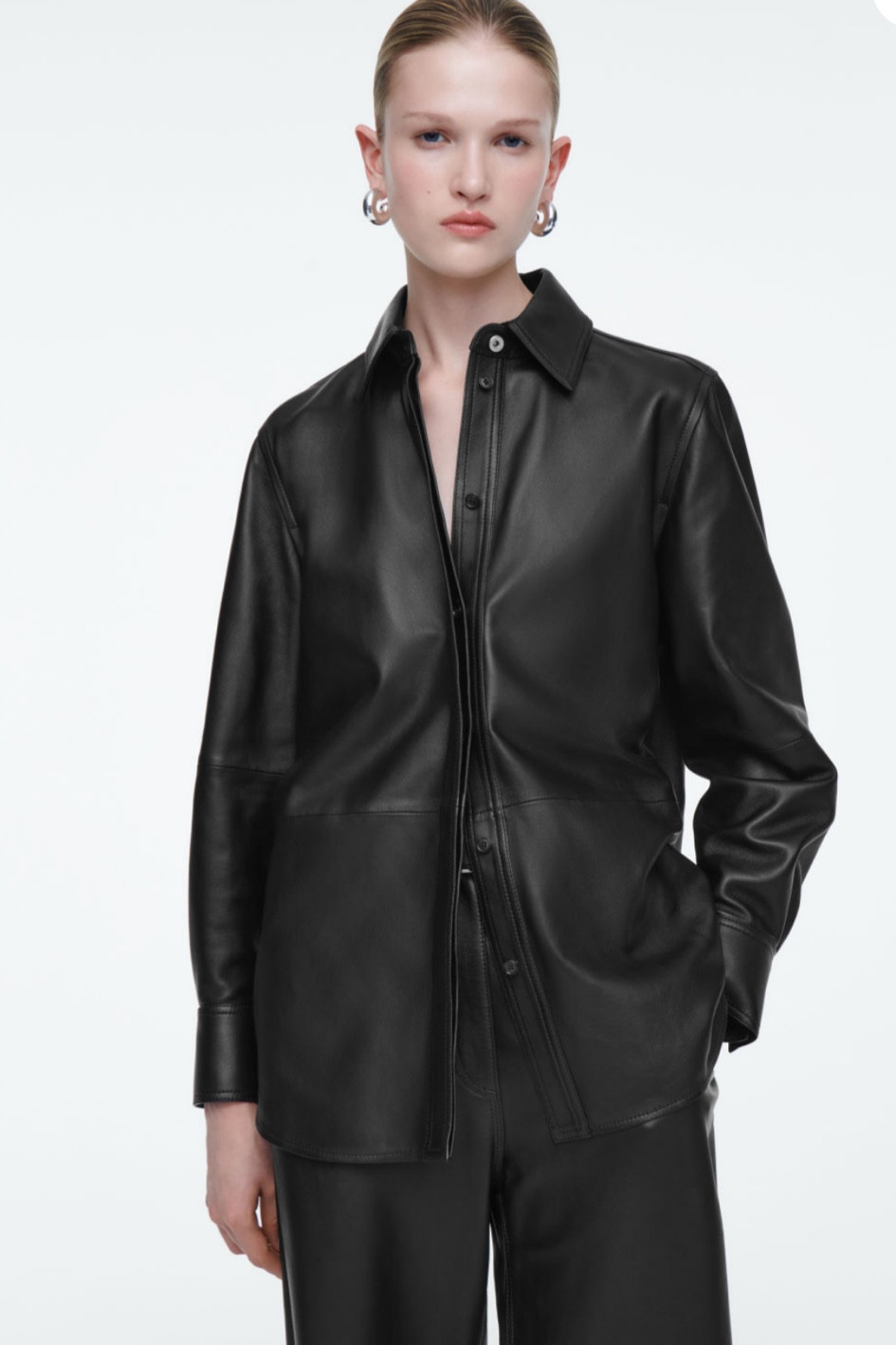 TOPSTITCHED LEATHER SHIRT 
Fall Outfit

This leather shirt is tanned an enduring black hue that speaks to an autumnal palette. It's crafted from butter-soft hide that will gain a unique patina with wear and has tonal topstitching that lends subtle structure to the relaxed shape. Style it with the coordinating pants for maximum impact.

#LTKWorkwear #LTKStyleTip #LTKSeasonal