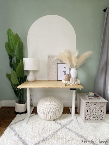 Give your home office a stylish makeover without breaking the bank! 

A lot of these cute details are fun DIY projects I share over on my blog, www.artsandclassy.com. My favorite piece of furniture in this room has to be the adjustable standing desk! 

#LTKHome #LTKSaleAlert