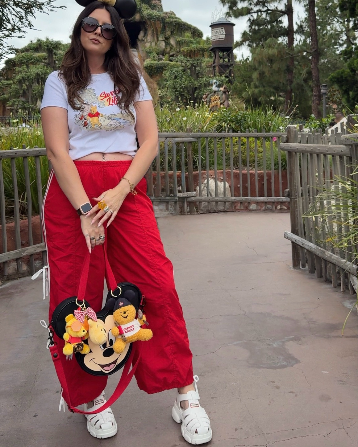 Winnie the Pooh Disney OOTD! These shoes were comfy! Like Disney Parks comfy! I was there for 5 hours walking around and my feet didn’t hurt at all. The pants are from Marshall’s but I’ll link something similar.

#LTKgrwm #LTKmomlife #LTKootd