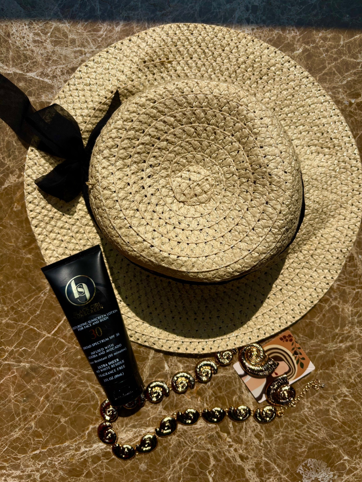 Beach essentials featuring a straw hat, gold seashell jewelry, and SPF. 

#LTKTravel #LTKFindsUnder50 #LTKSeasonal