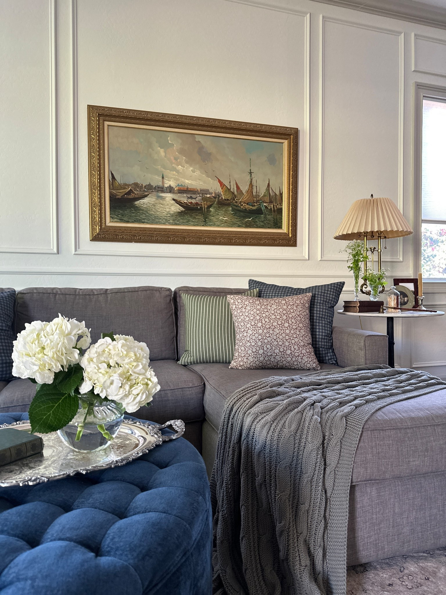 Living room reset with patterned pillows and fresh florals 

#LTKHome #LTKSeasonal