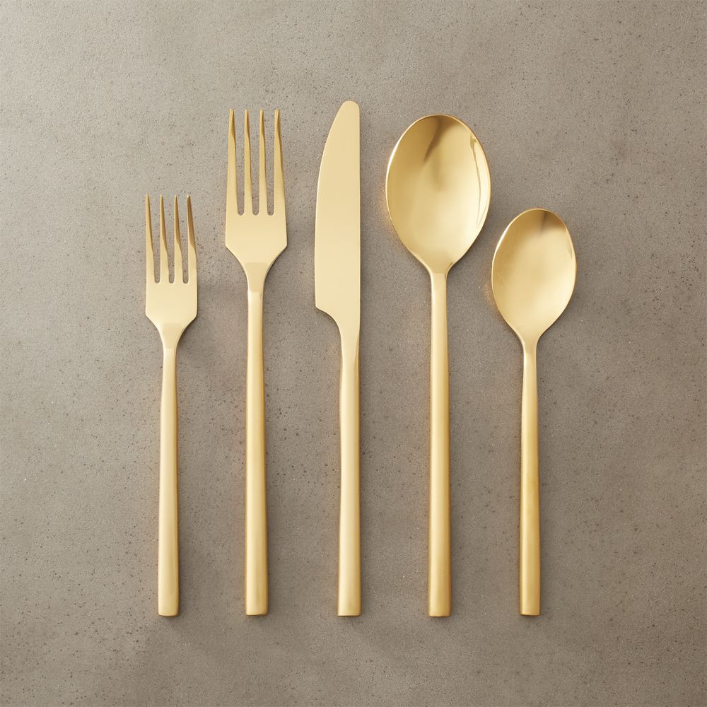 20-piece rush gold flatware set | CB2