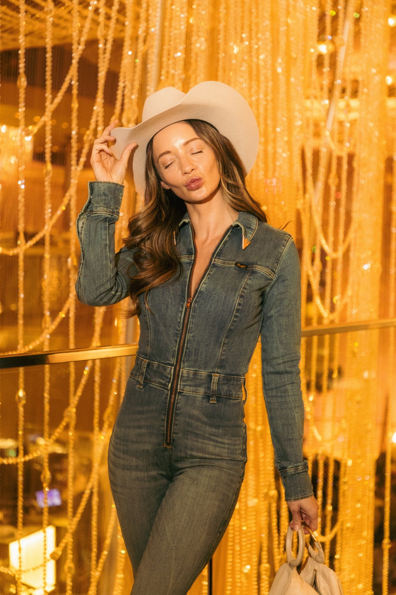 NFR outfit 
Rodeo outfit 
Country concert outfit 
Cowboy hat 
Denim jumpsuit  
Wrangler x Lainey Wilson catsuit 