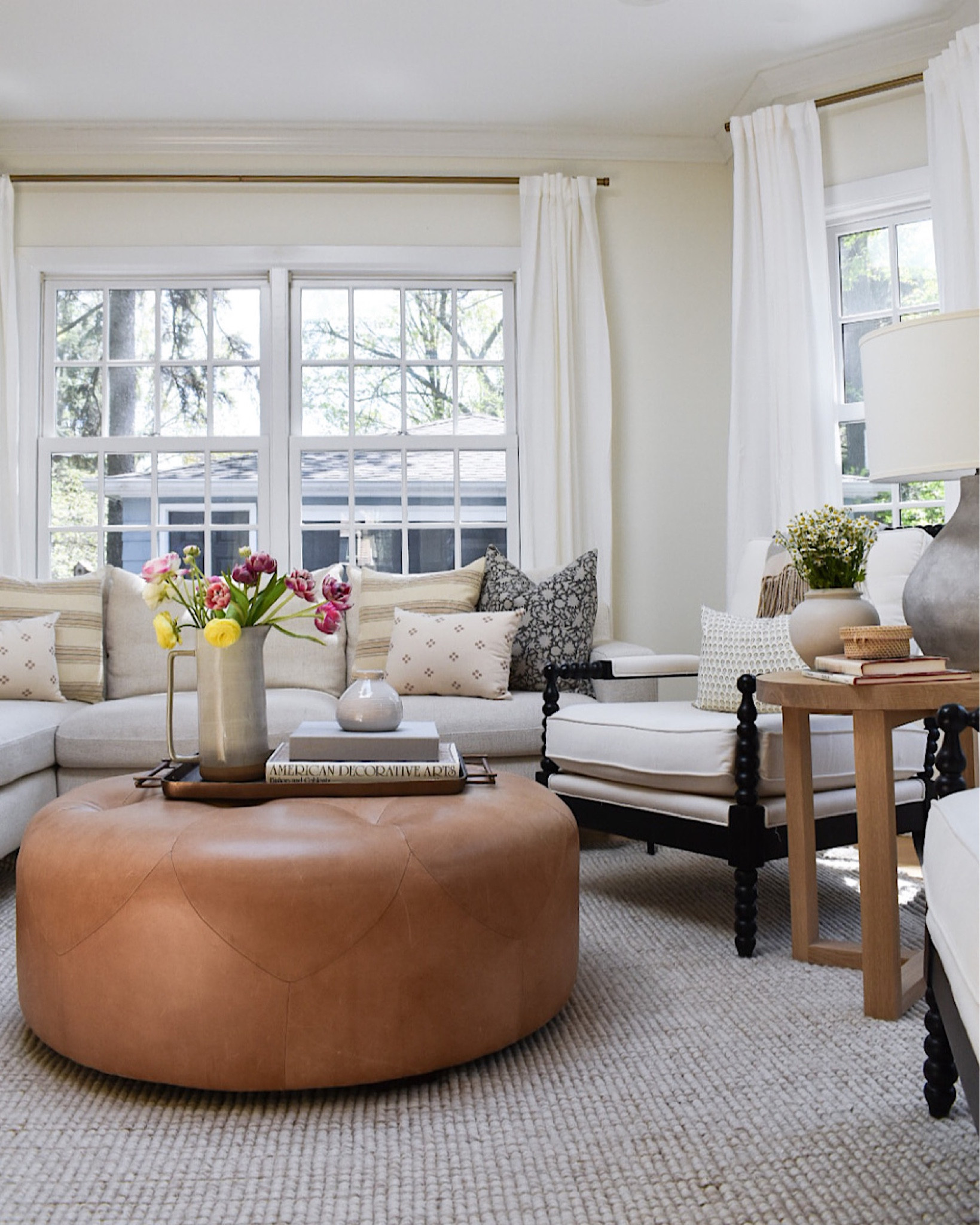 We haven’t shown this space much in the past because Lo’s littles are typically leapfrogging from the ottoman. BUT fresh garden flowers + fresh @danielleoakeyshop pillows were too irresistible not to capture. We love this room in the Spring. 🌼🌷🌸

#LTKhome #LTKSeasonal #LTKfamily